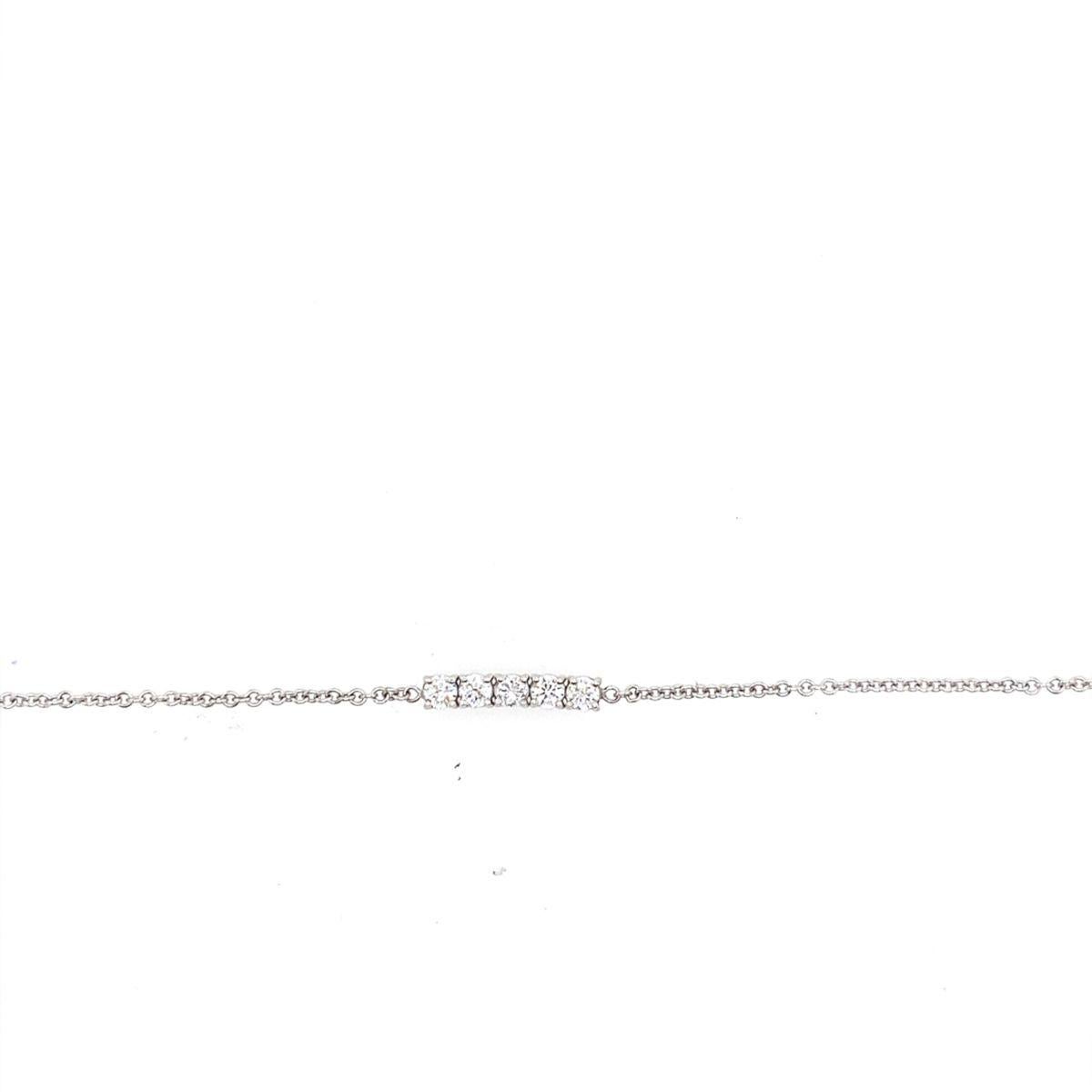 18ct White Gold Tennis/Chain Bracelet, Set With 4 Round Brilliant Cut Diamonds

Additional Information:
Total Diamond Weight: 0.50ct
Diamond Colour: G/H
Diamond Clarity: SI1
Total Weight: 2.6g
Diamond Head Size: L 14.85 mm x W 3.45mm
SMS4939

