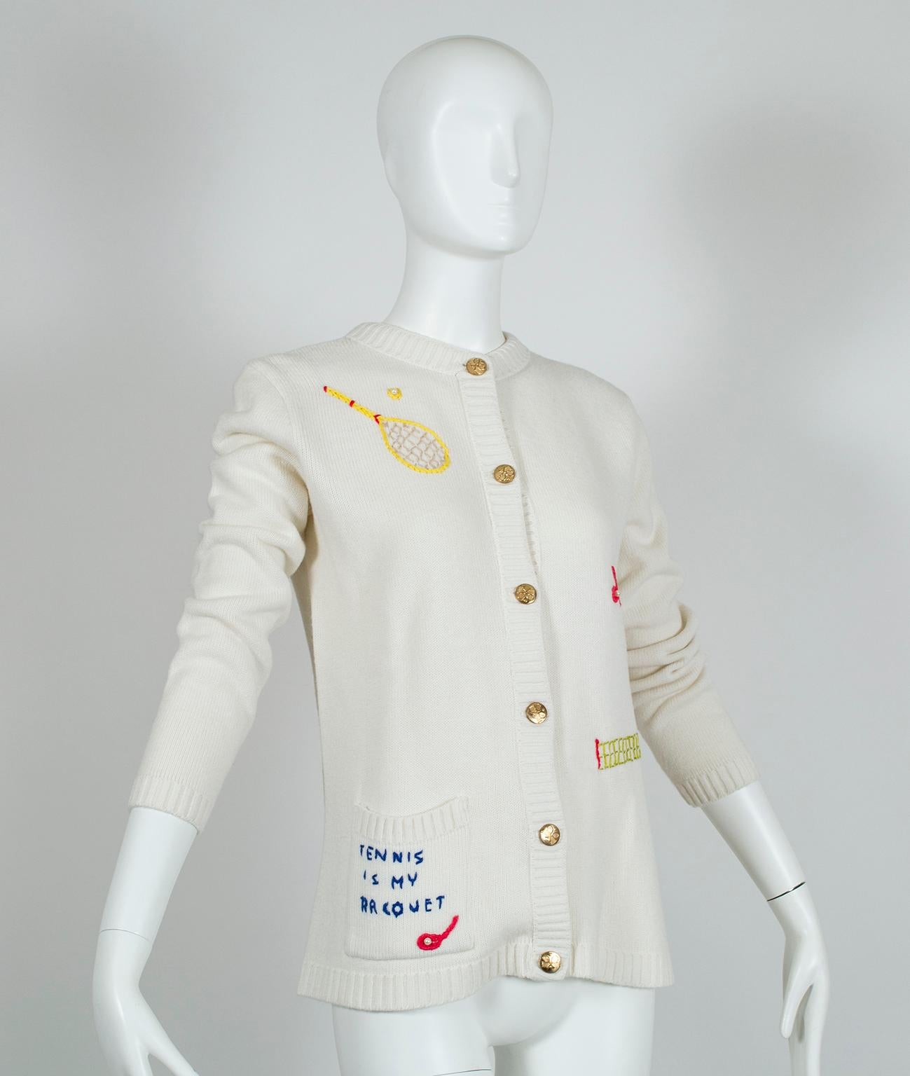 A must for any tennis lover, this unique novelty cardigan will make you feel like Maria Sharapova even if you play like a novice. Lovingly hand made, it is adorned with hand stitched tennis racquets, nets, pearl tennis balls and stitched phrases on