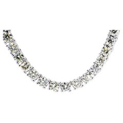 Tennis Necklace in 18K White Gold with Round Diamonds. D28.66ct.t.w.