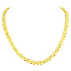 Tennis Necklace with Fancy Yellow Slanted Pear Shapes