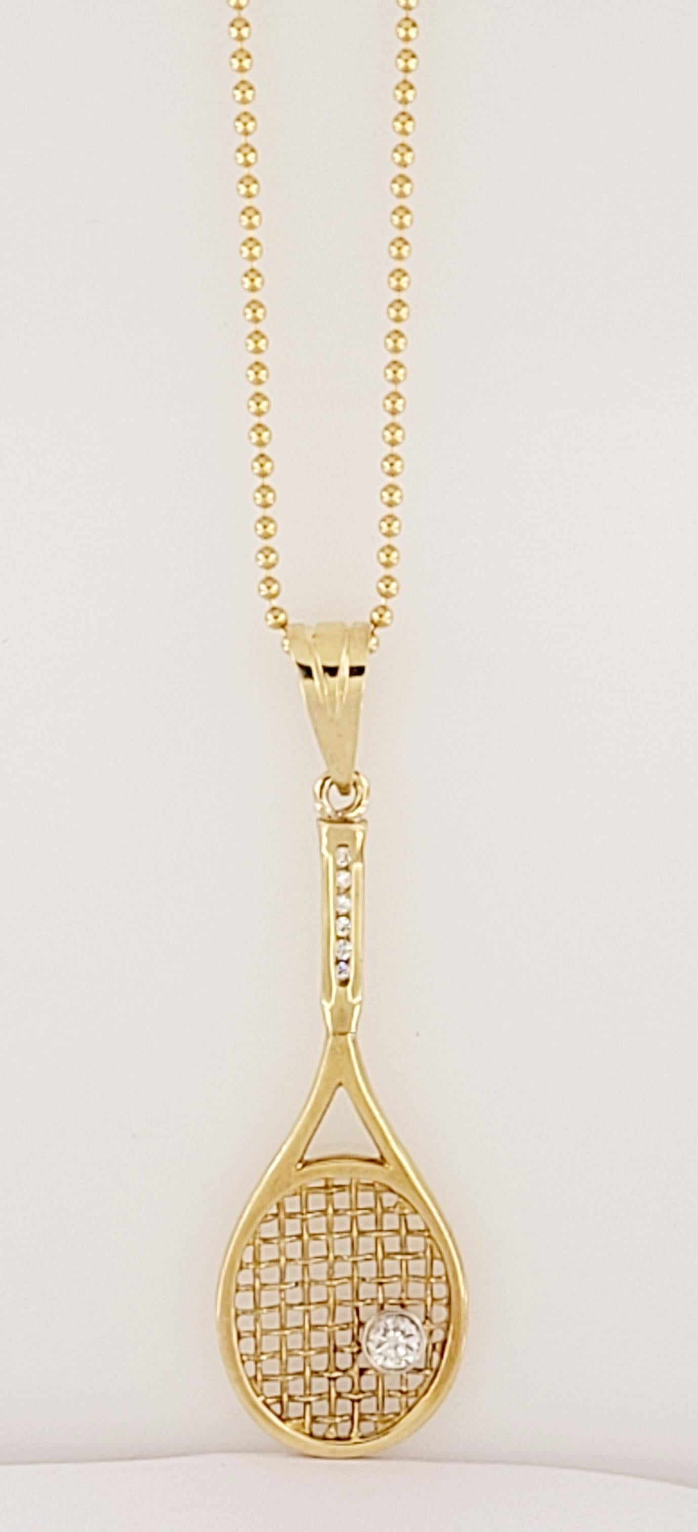 Hand-Made Tennis Pendant with Chain
Material 14K Yellow Gold 
Big Main Diamond .15ct
Diamonds .08ct 
Total Diamonds .23ct 
Diamond Clarity VS
Color Grade F
Dimension 54 X 16mm
Chain Length 20'' 
Chain Width 1.5mm
Pendant weight 5.4gr 
Condition New,