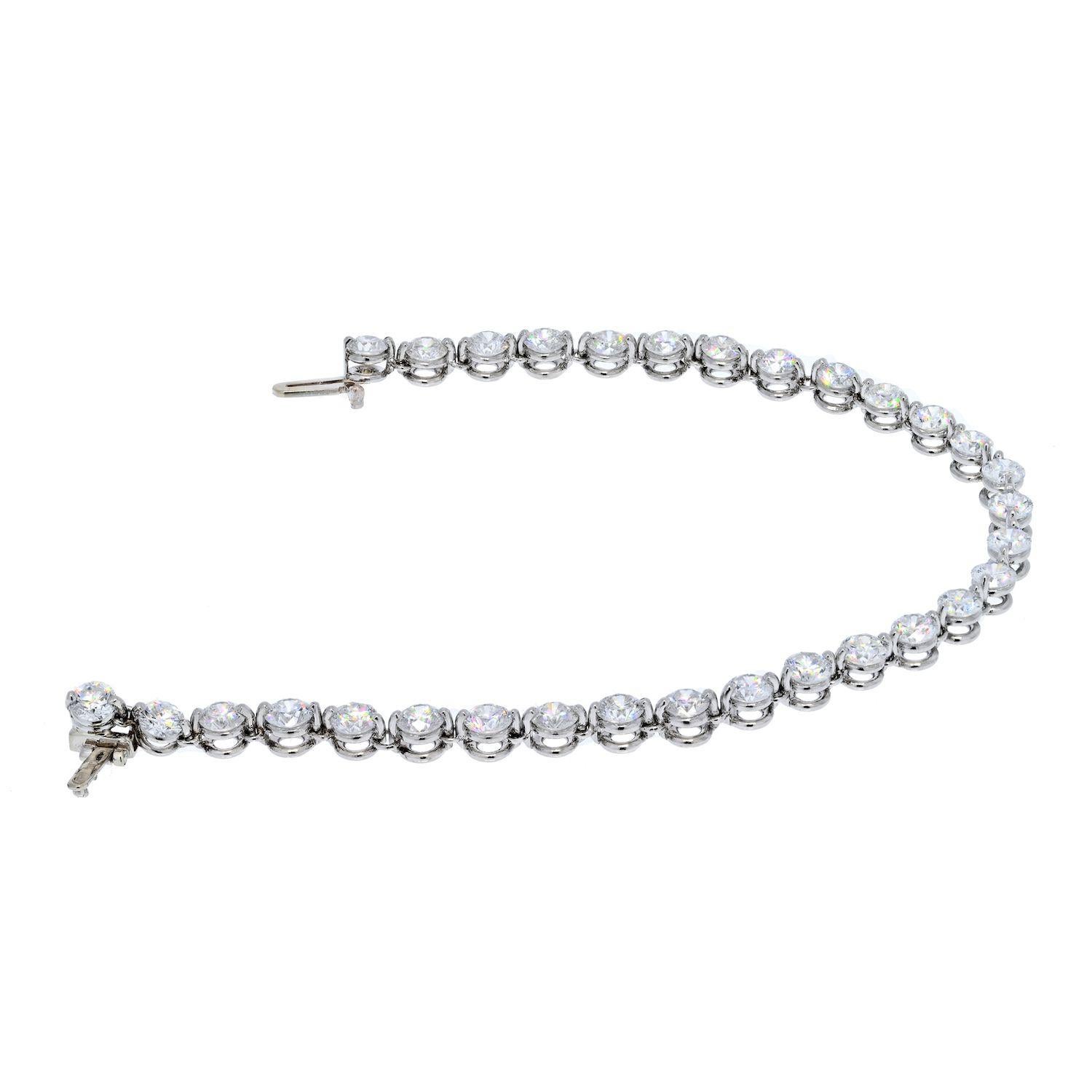 7.48cts Round Brilliant Cut Shared Prong Bracelet. 7 inches long, Single shred prong setting. Smooth and young looking. Sparkly F-G color diamonds, VS-SI clarity.