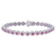 Tennis soft bracelet with all around ruby with a halo of round diamonds