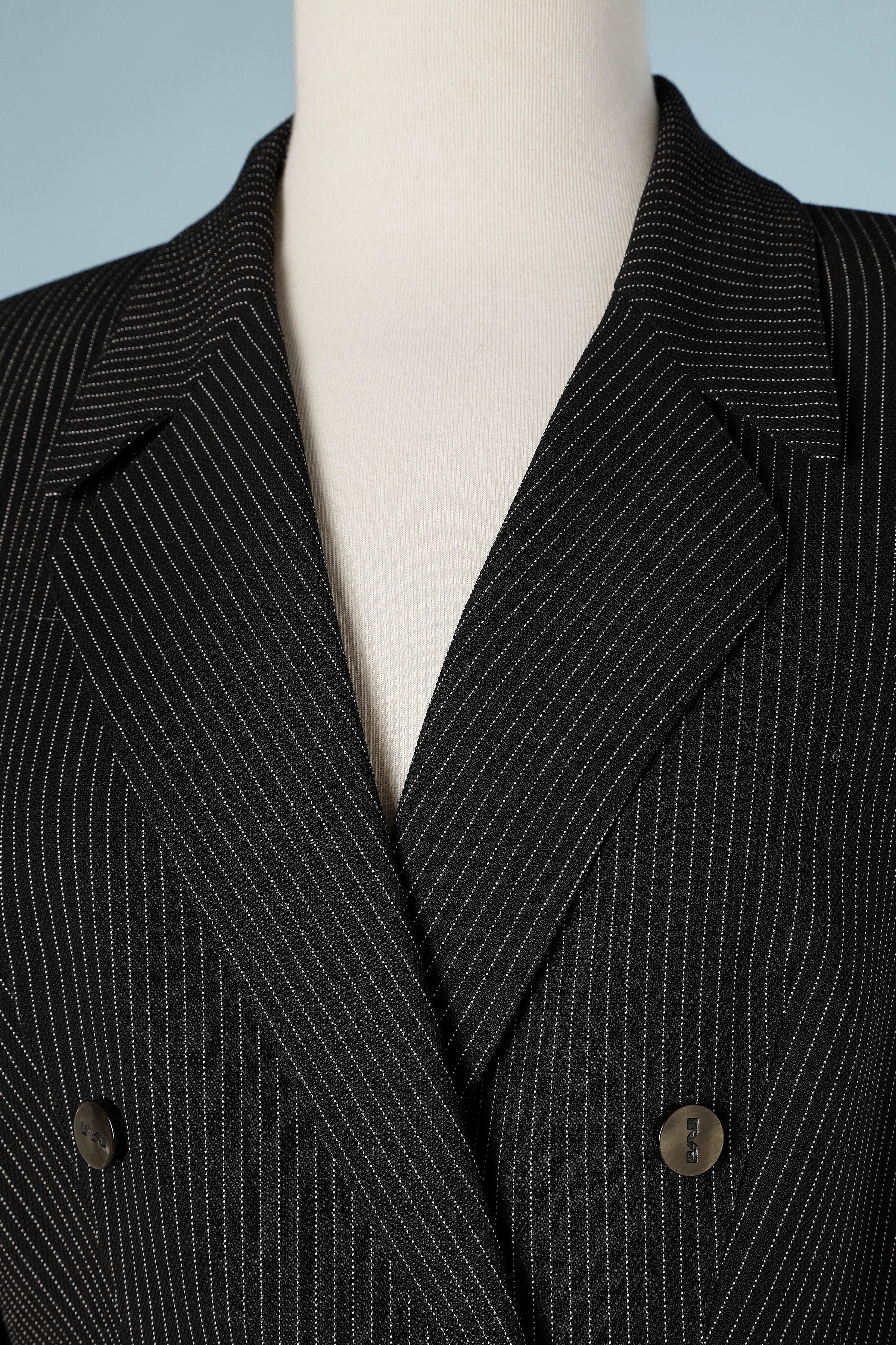 Tennis stripe skirt-suit in wool with branded  snap.Double-breasted jacket . Wrap skirt. 
SIZE 38 (M)
