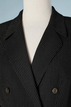 Tennis stripe skirt-suit in wool with branded snap.  Thierry Mugler