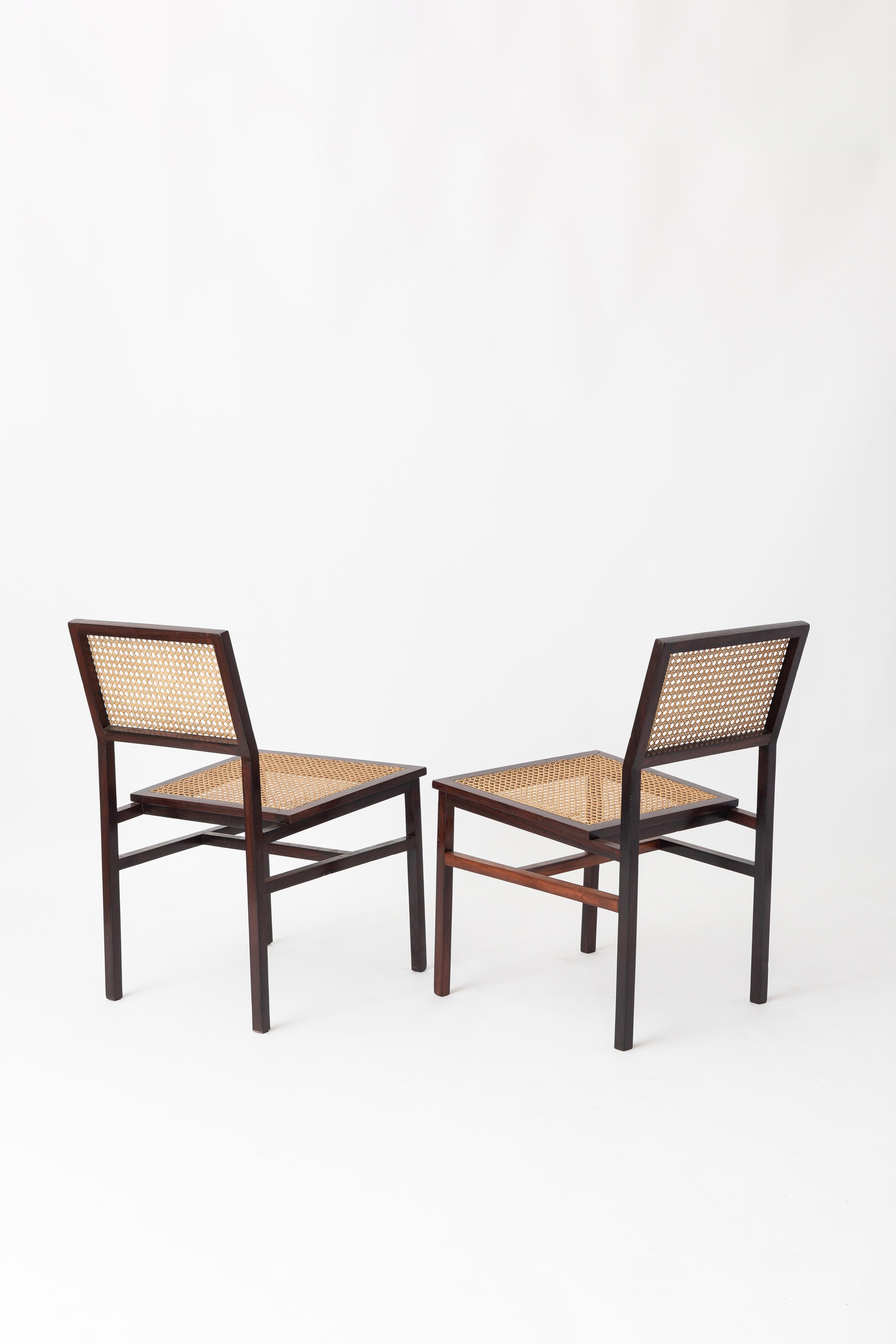 Brazilian Tenreiro pair of wood and cane chairs (with original label) For Sale