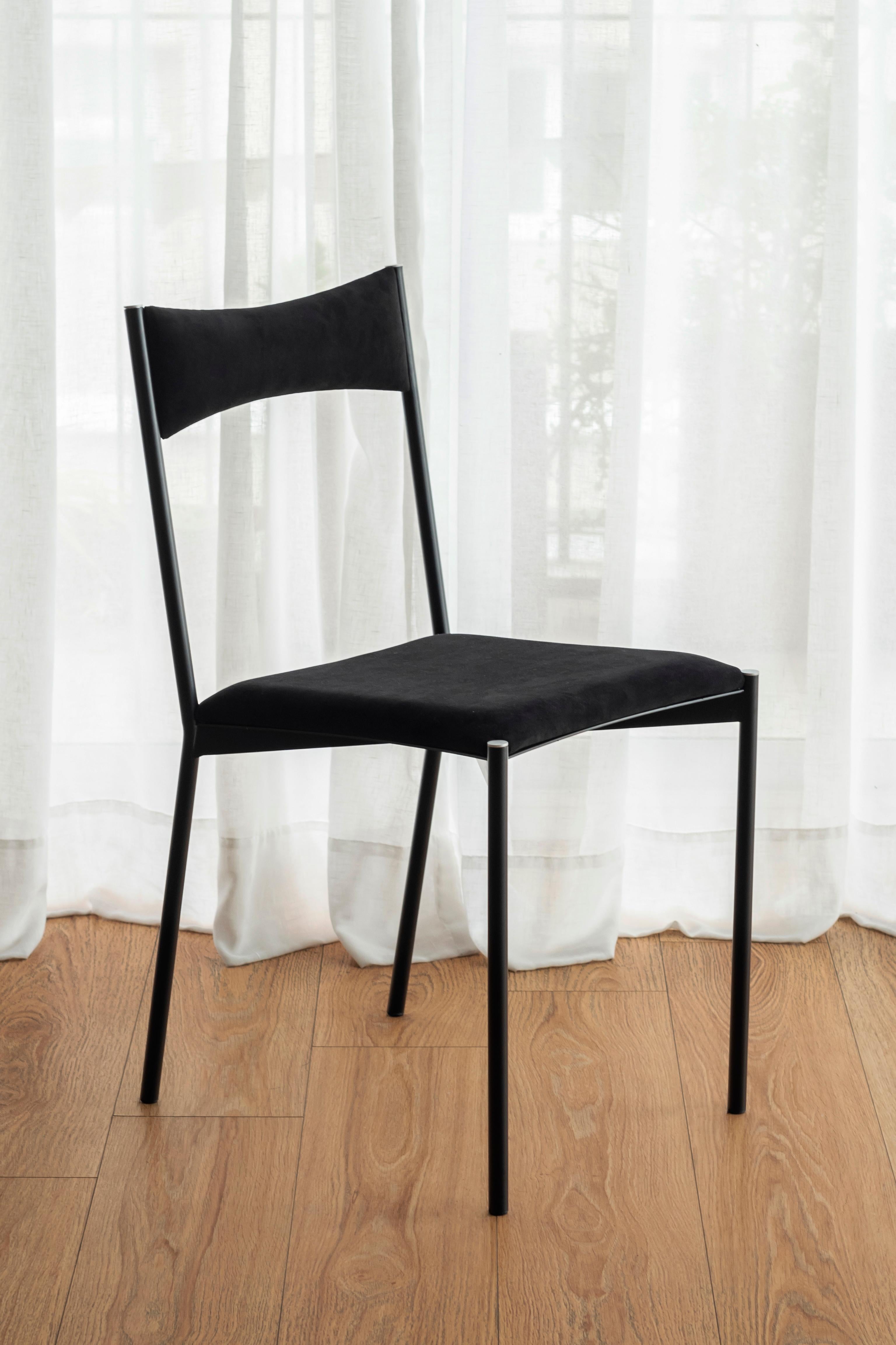 Tensa chair, black by Ries
Dimensions: W40 x D49,5 x H82 cm 
Materials: Round steel tube, laser cut metal sheet, high density foam, velvet upholstery, aluminum/bronze caps
Matte powder coated painting (Finishings)

Also Available: Dark Blue,