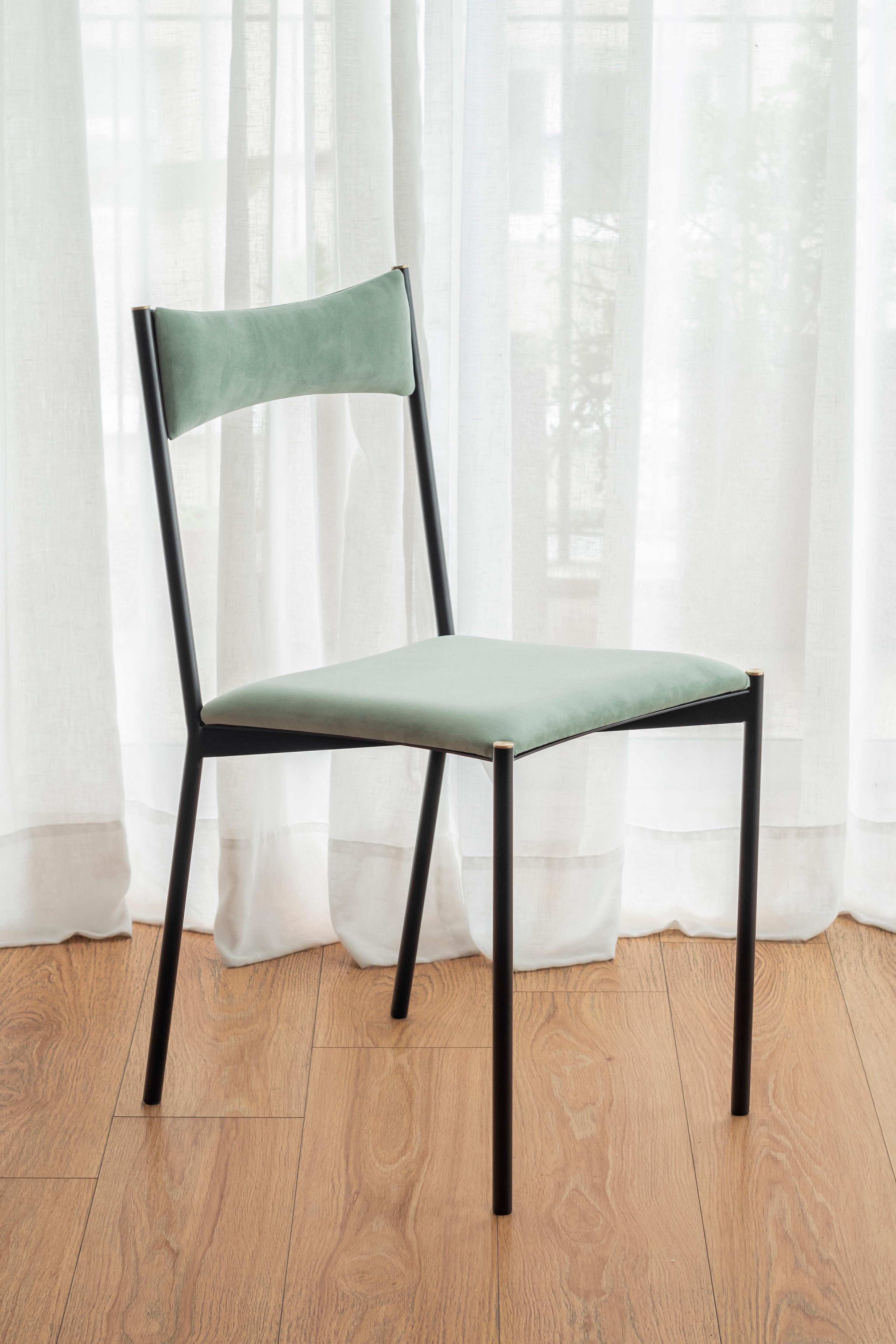 Chaise Tensa, Light Green by Ries
Dimensions : L40 x P49,5 x H82 cm 
MATERIAL : Tube d'acier rond, tôle découpée au laser, mousse haute densité, revêtement en velours, caches en aluminium/bronze.
Peinture par poudrage mat (Finitions)

Egalement