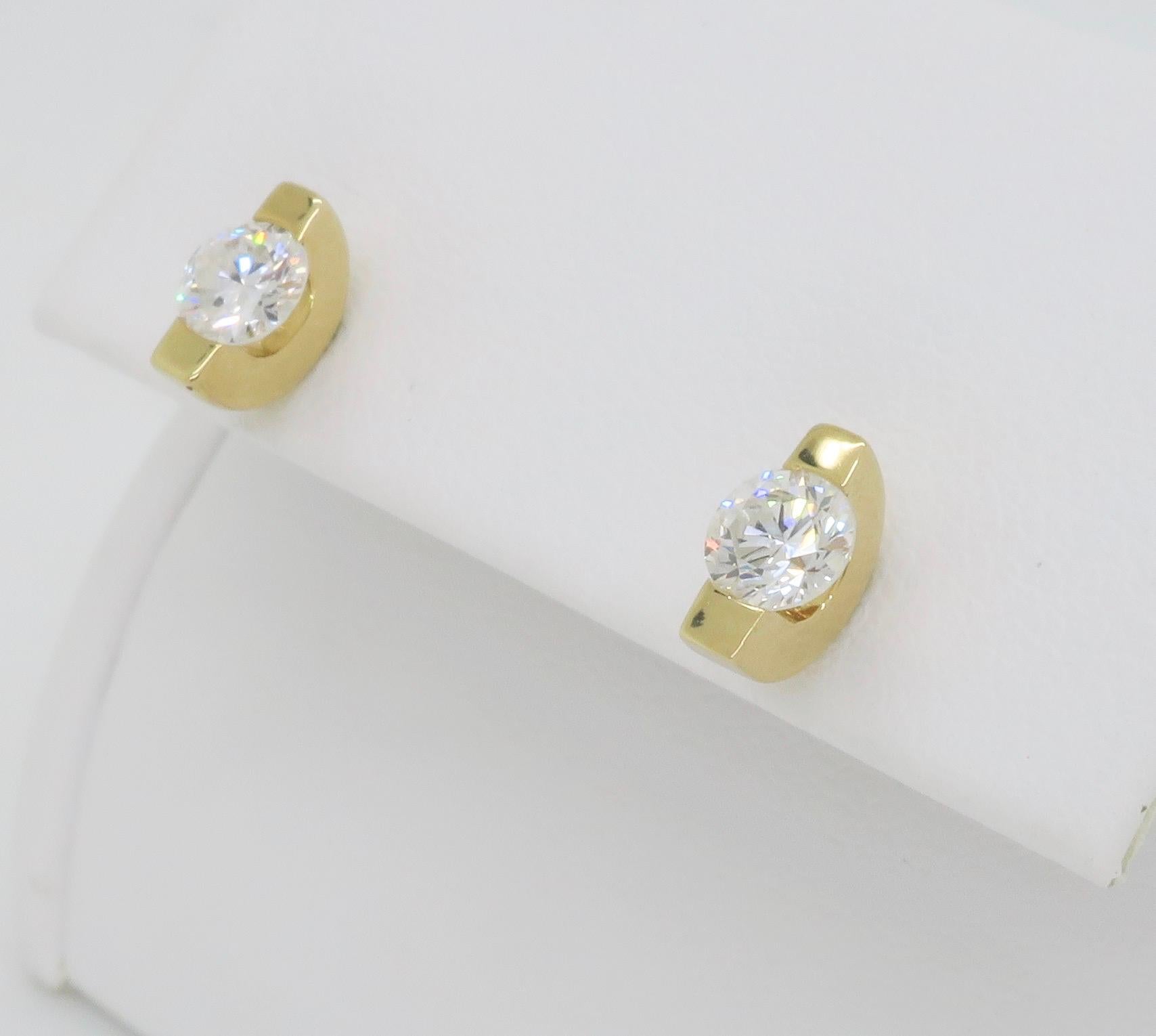 Round Cut Tension Set Diamond Stud Earrings  For Sale