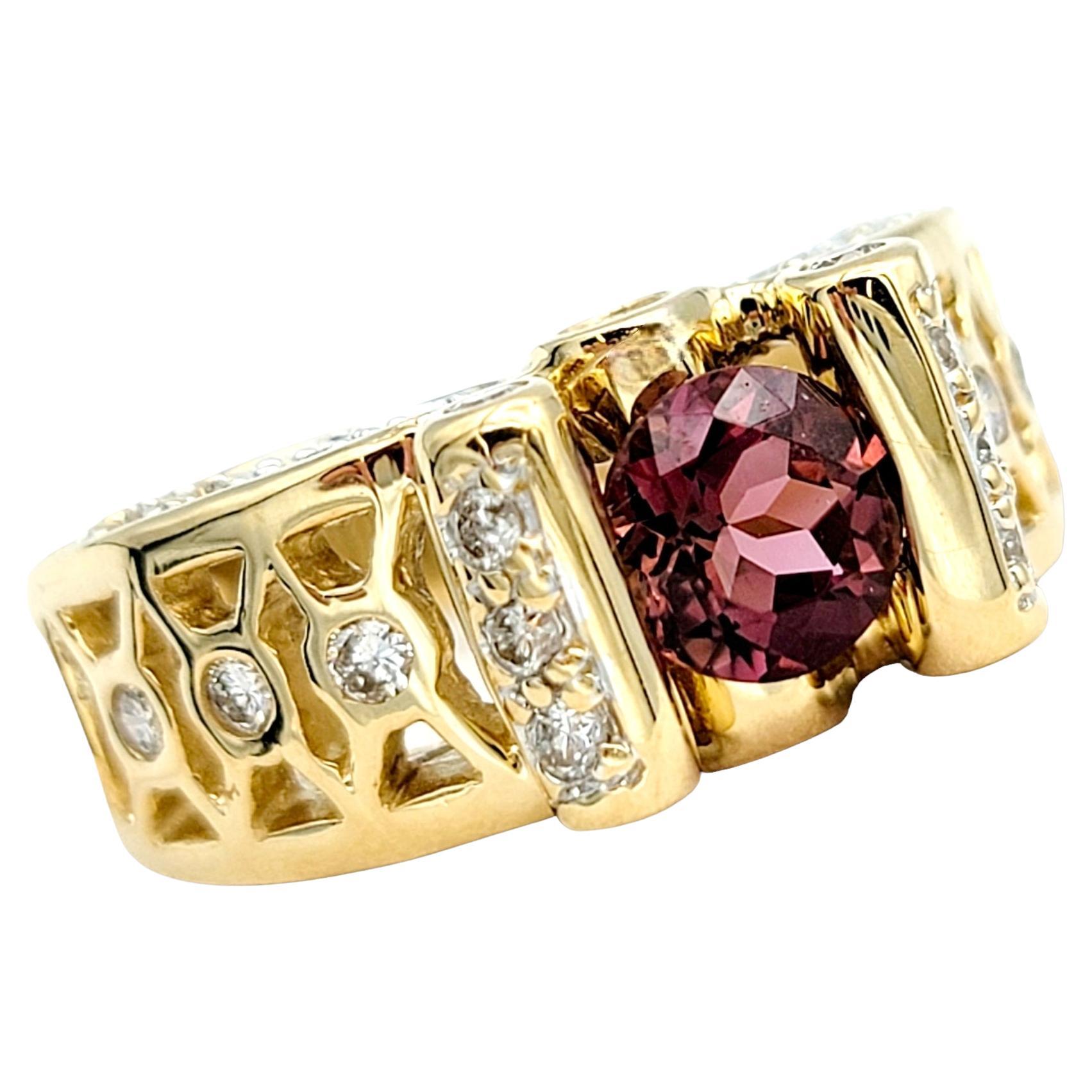 Ring size: 6 

This exquisite ring is a stunning embodiment of timeless elegance and contemporary design. Crafted from lustrous 14 karat yellow gold, it showcases a mesmerizing tension set red round tourmaline as its centerpiece. The tension setting