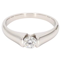 Tension Set Solitaire Diamond and Platinum Engagement Ring