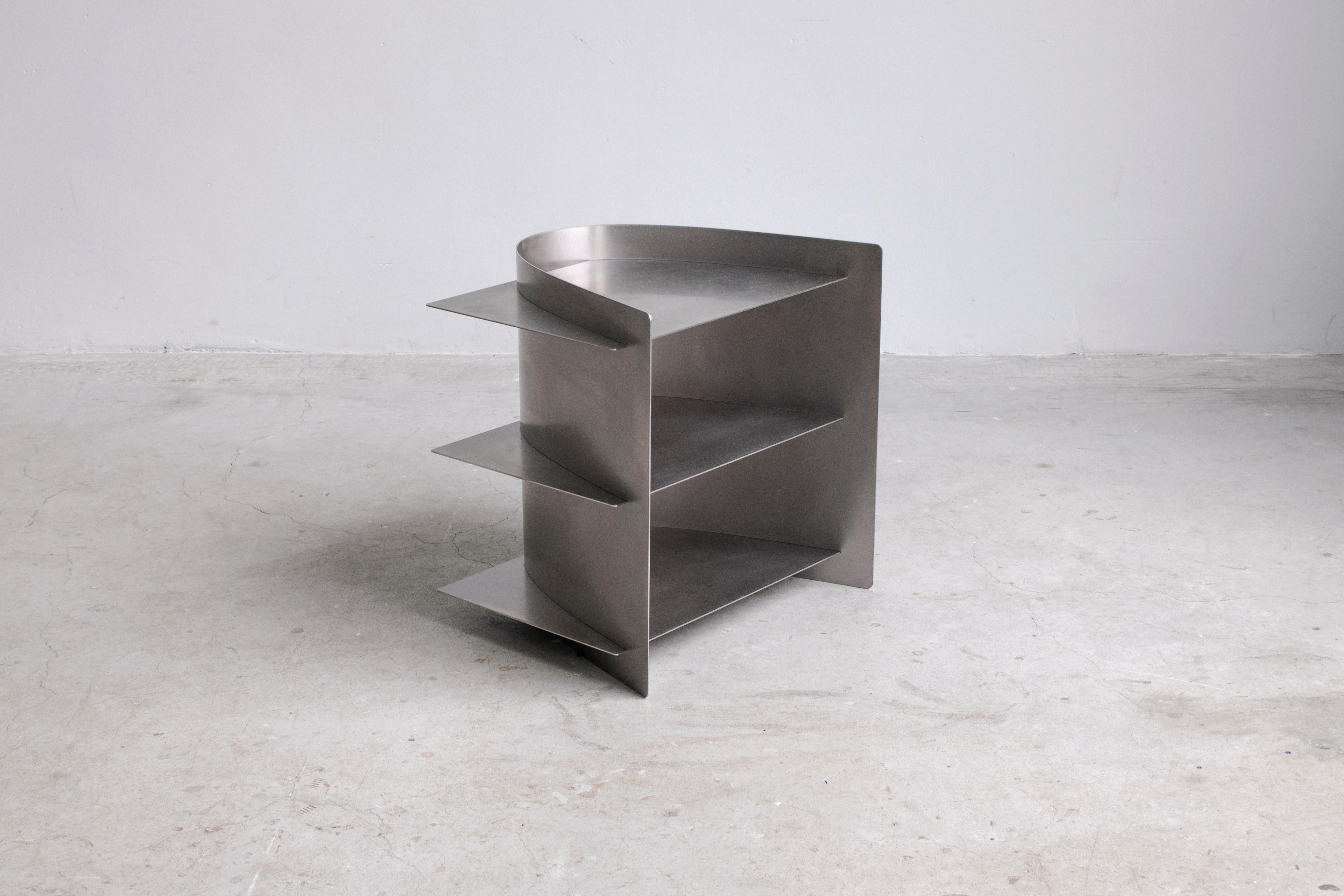 Tension side table, Paul Coenen
Dimensions: 50 x 45 x 50 cm
Materials: Sanded and waxed stainless steel

Custom colors and materials are possible on request.

Tension Collection The manufacturing industry is using standard sized material, and