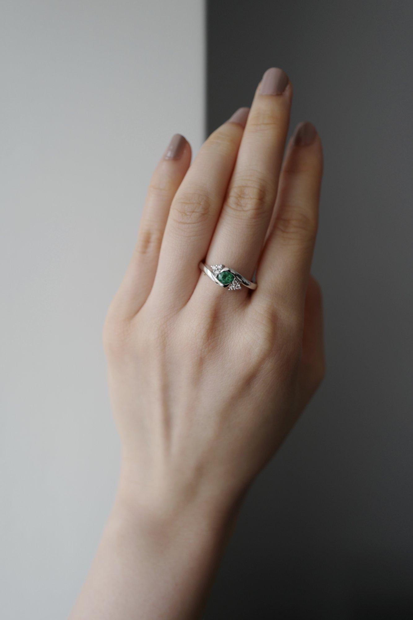For Sale:  Tension Twist Round Cut Emerald and Diamond Engagement Ring in 18K White Gold 2