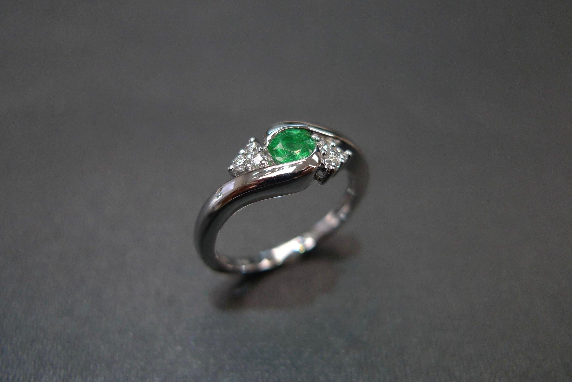 For Sale:  Tension Twist Round Cut Emerald and Diamond Engagement Ring in 18K White Gold 3