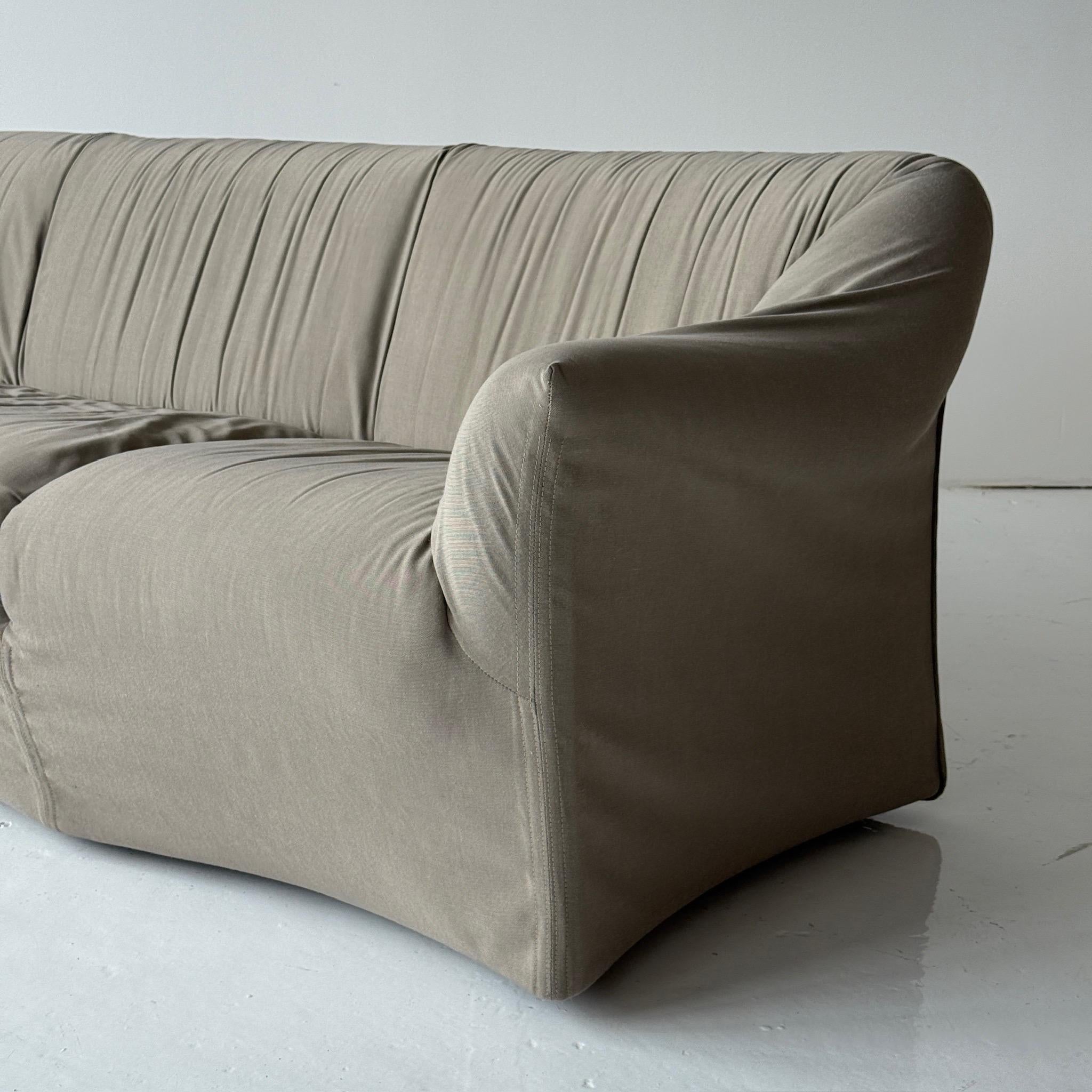 c. 1970s. Italy. Original cotton upholstery. Curved and draped lines. 


