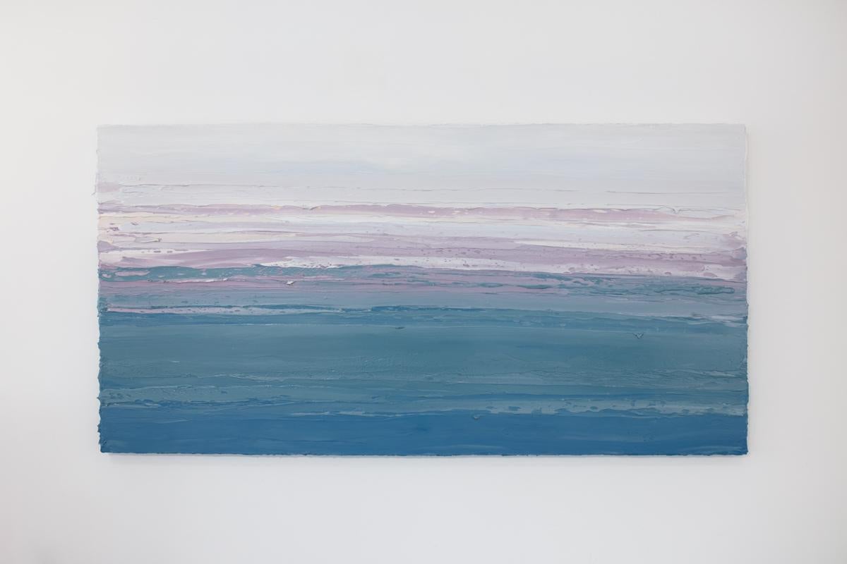This horizontal abstract painting by Teodora Guererra features a blue, teal, lavender and white palette. The artist layers thick strokes of paint using a palette knife in broad, horizontal sweeping strokes over gallery wrapped canvas, creating an