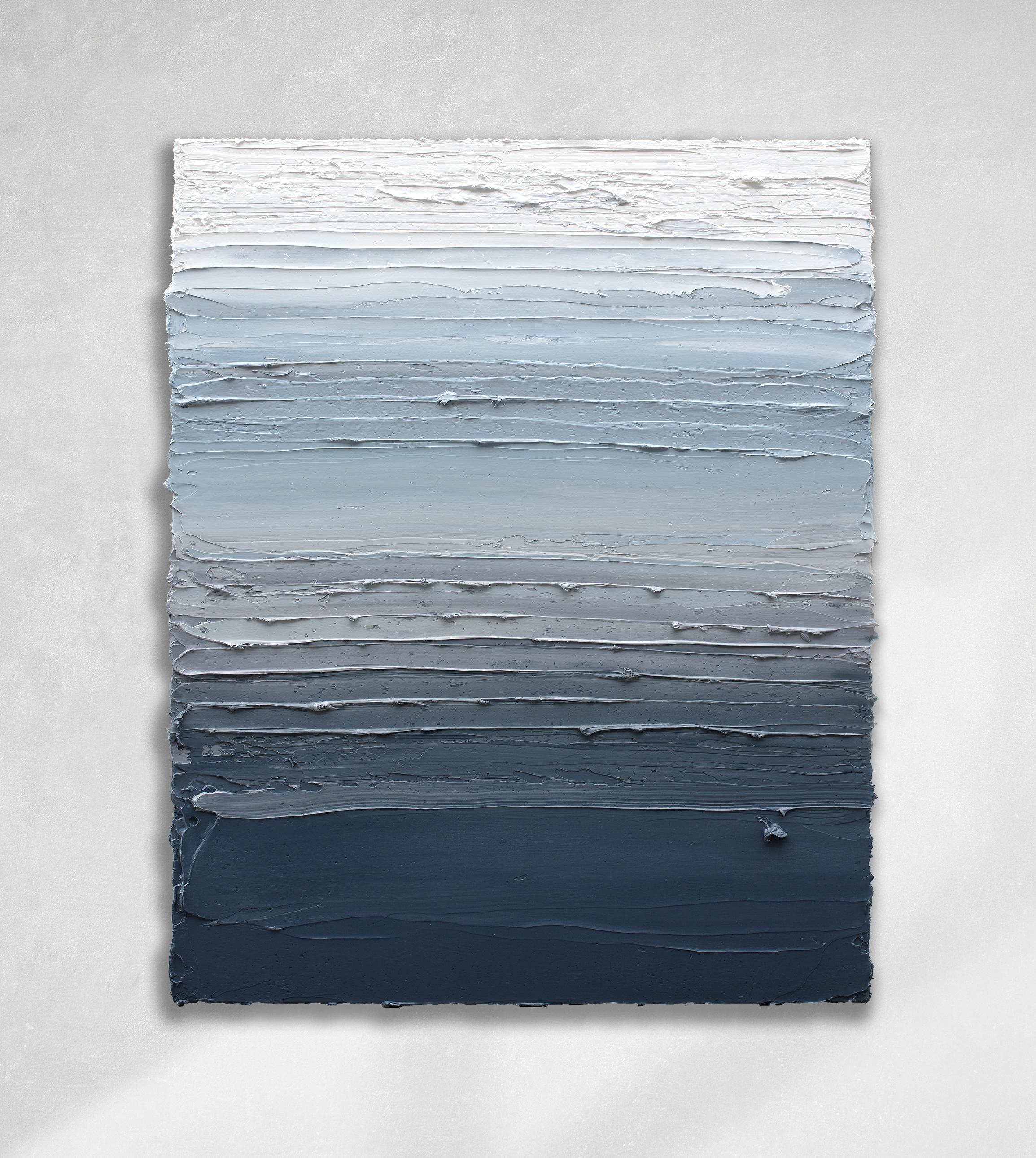 This abstract painting by Teodora Guererra features a blue and white palette ranging from deep blue-grey at the bottom of the composition, and fading up to light blue and white at the top. The artist applies thick layers of oil paint in wide,