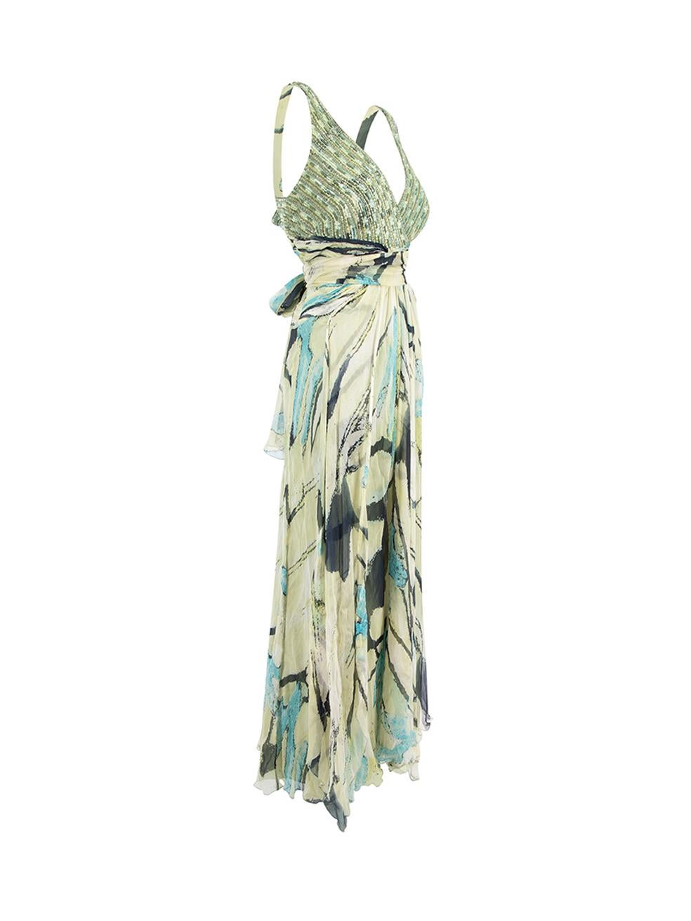 CONDITION is Very good. Minimal wear to dress is evident. Loose threads and a couple of missing beads near the left shoulder as well as fraying to hemline on this used Terani Couture designer resale item.   Details  Green Silk Maxi gown Abstract