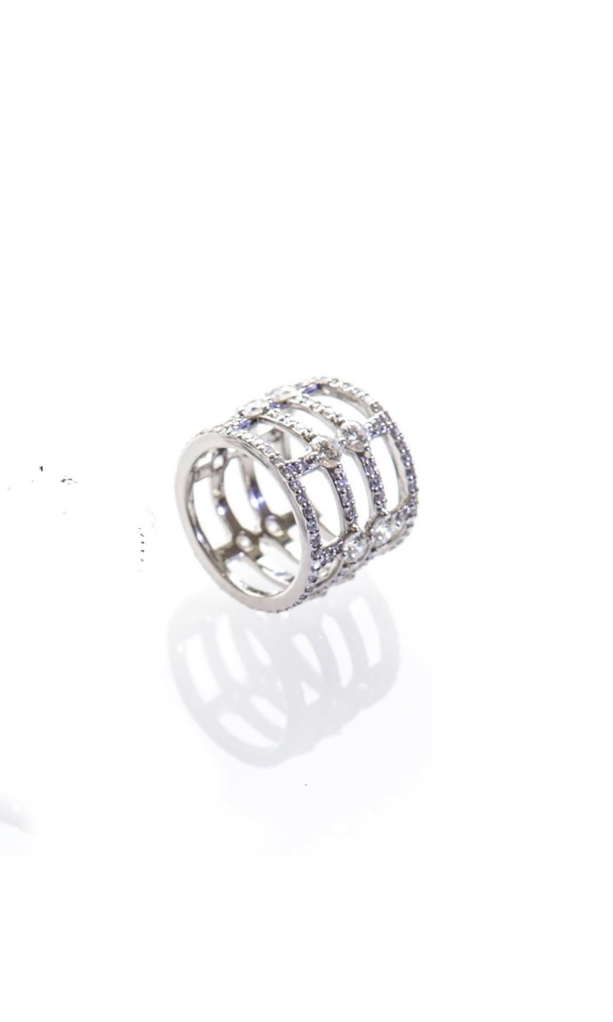 14k White Gold with White Diamonds 3.42tw

I was inspired by the iron fencing while on a tour in the garden district of New Orleans when I started designing my first collection.  You really get a feel of the Victorian styling.   I was equally