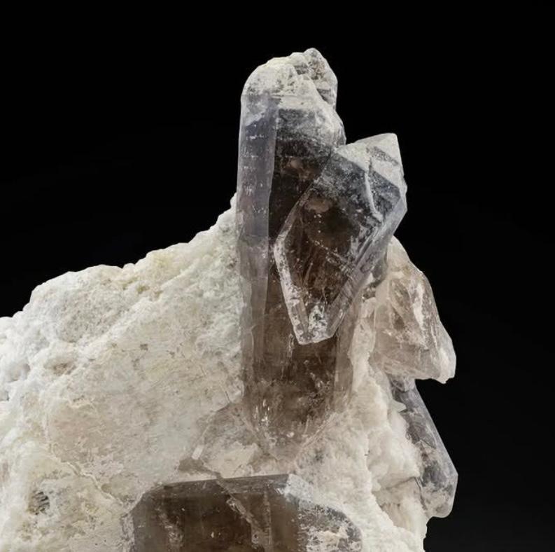 Product Information:

Specimen Type: Smoky Quartz on Albite

Weight: 360 grams

Dimension: H: 11.5 x W: 9 x D: 4.5 cm 

Origin: Dara I Pech, Chappa Dara District, Kunnar Province, Afghanistan 

Treatment: None

Description: 

erminated and isolated