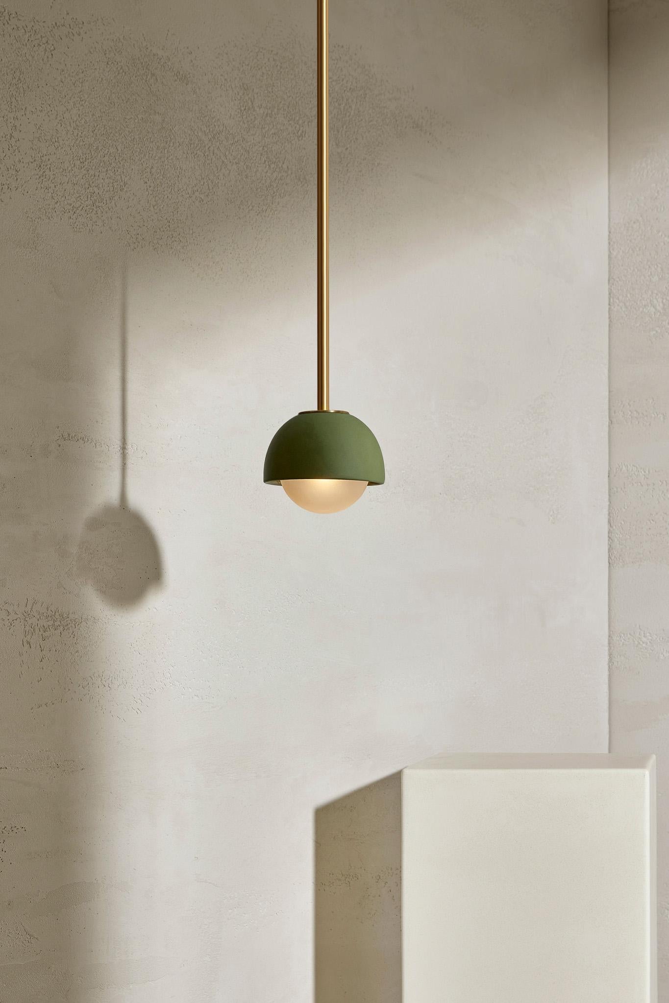 Simple cylindrical ceramic forms define the TERRA 0 range, which comes in pendant light, and long and short articulating wall light formats. The TERRA 0 Pendant Light is available in a choice of three tones – Slate, Sage and Vanilla Bean. Each