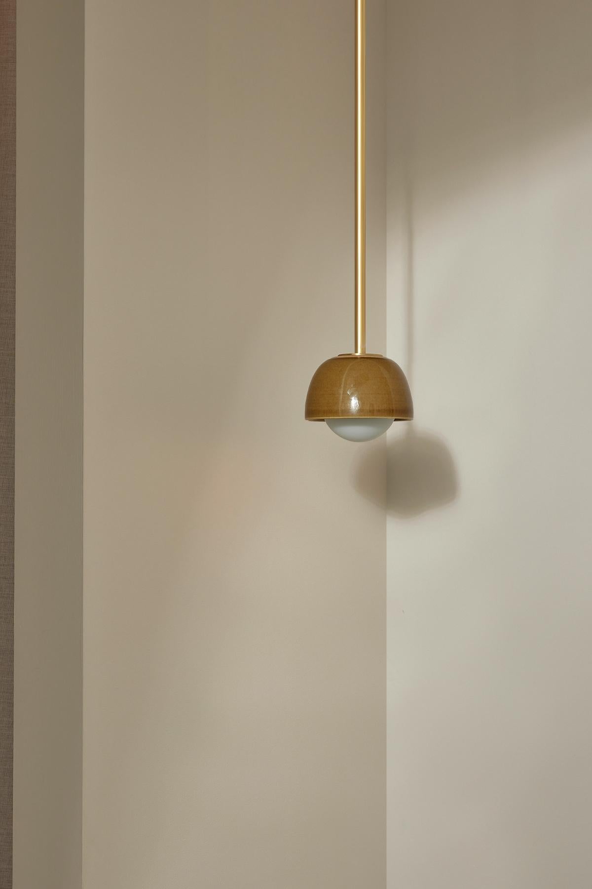 Simple cylindrical ceramic forms define the TERRA 0 range, which comes in pendant light, and long and short articulating wall light formats. The TERRA 0 Pendant Light is available in a choice of six tones Vanilla Bean, Chartreuse, Olive, Lead, Fog &