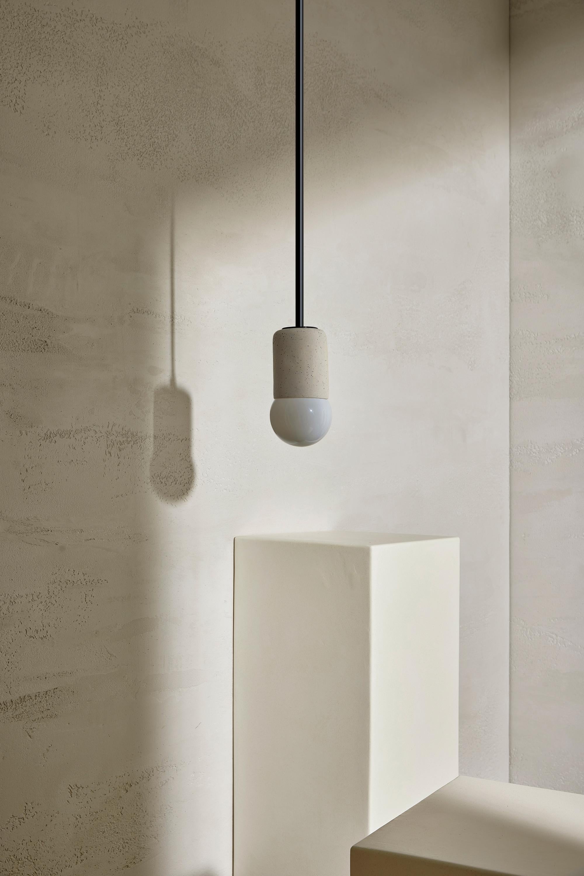 Simple cylindrical ceramic forms define the Terra 1 lighting range, which comes in pendant light, wall light, and in long and short articulating wall light formats. The Terra 1 Pendant Light is available in a choice of three tones – Slate, Sage and