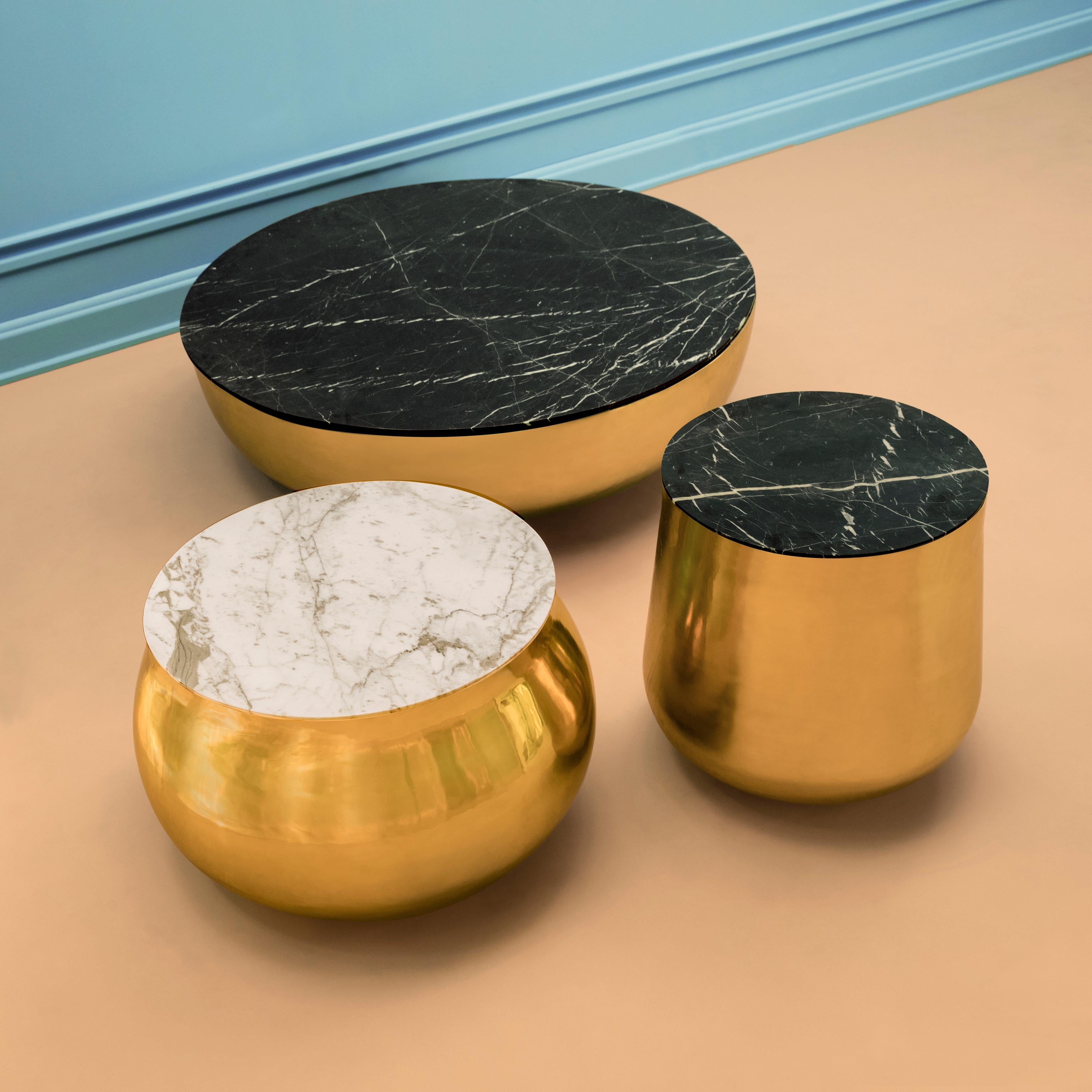 Terra Alto Side Table in Brass with Black Marquina Marble Top by Dario Contessotto is a circular coffee or side table in brass with an Italian marble top in white or black by Scarlet Splendour. 

Terra, the beautiful collection inspired by the