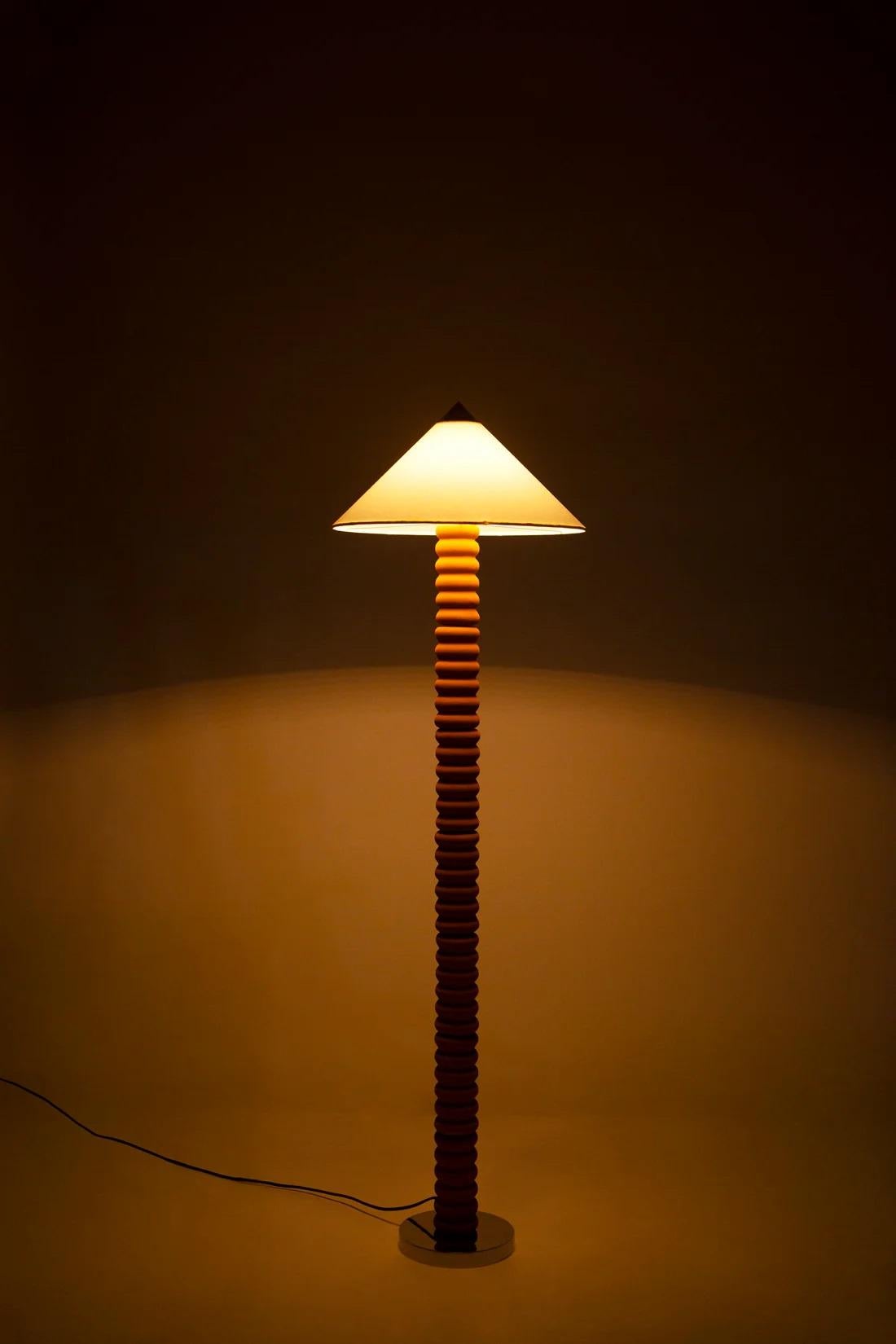 Terra Contour Floor Lamp by Hatsu
Dimensions: D 45 x H 155 cm
Materials: Ceramic, metal, fabric.

All our lamps can be wired according to each country. If sold to the USA it will be wired for the USA for instance.

This floor lamp features a ribbed