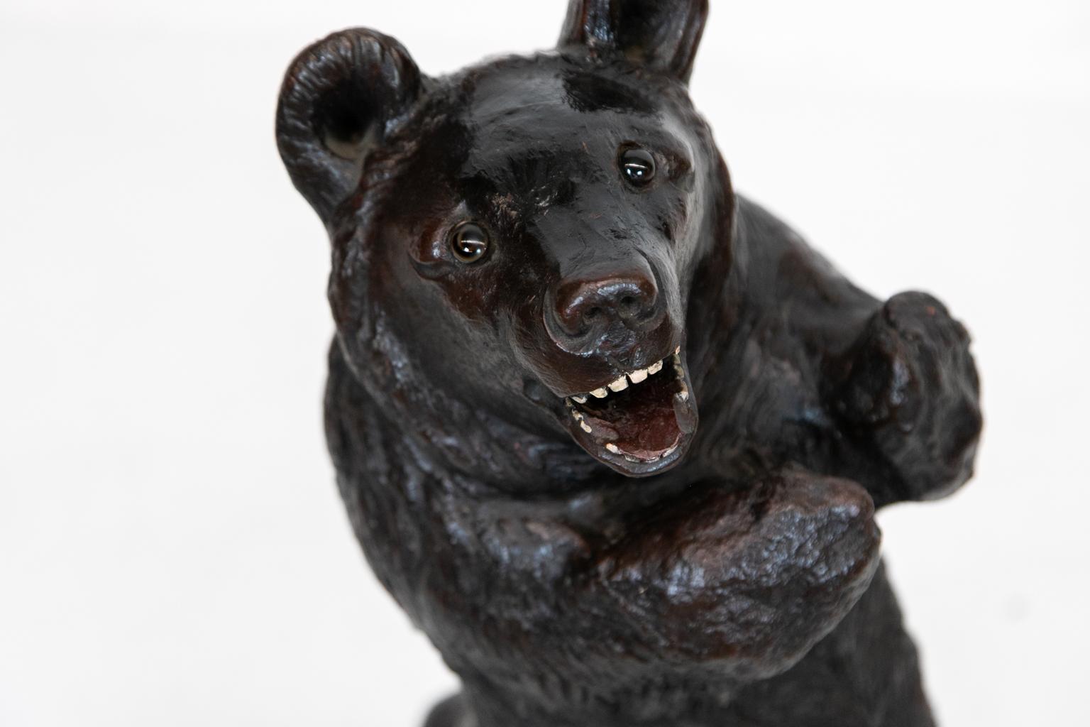 Terracotta Black Forest bear, retaining its original glass eyes. The figure is removable from the 5 .5 inch base.