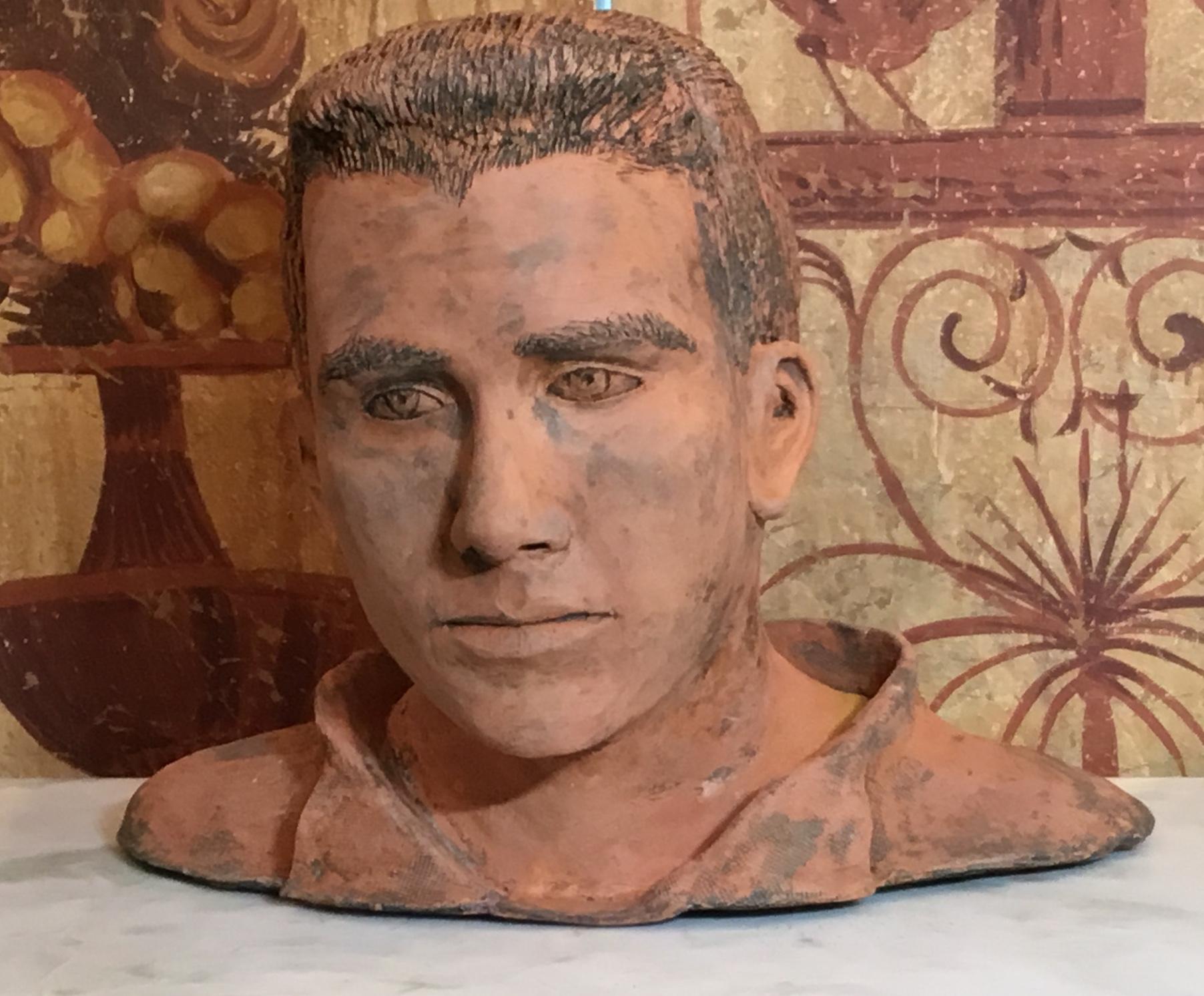 Intriguing bust of a young man made of rustic unglazed ceramic great eyes expression, looking forward, beautiful object of art from any angle .signed and dated MD 6/91.
If anybody know anything about who is the artist please let me know.

   