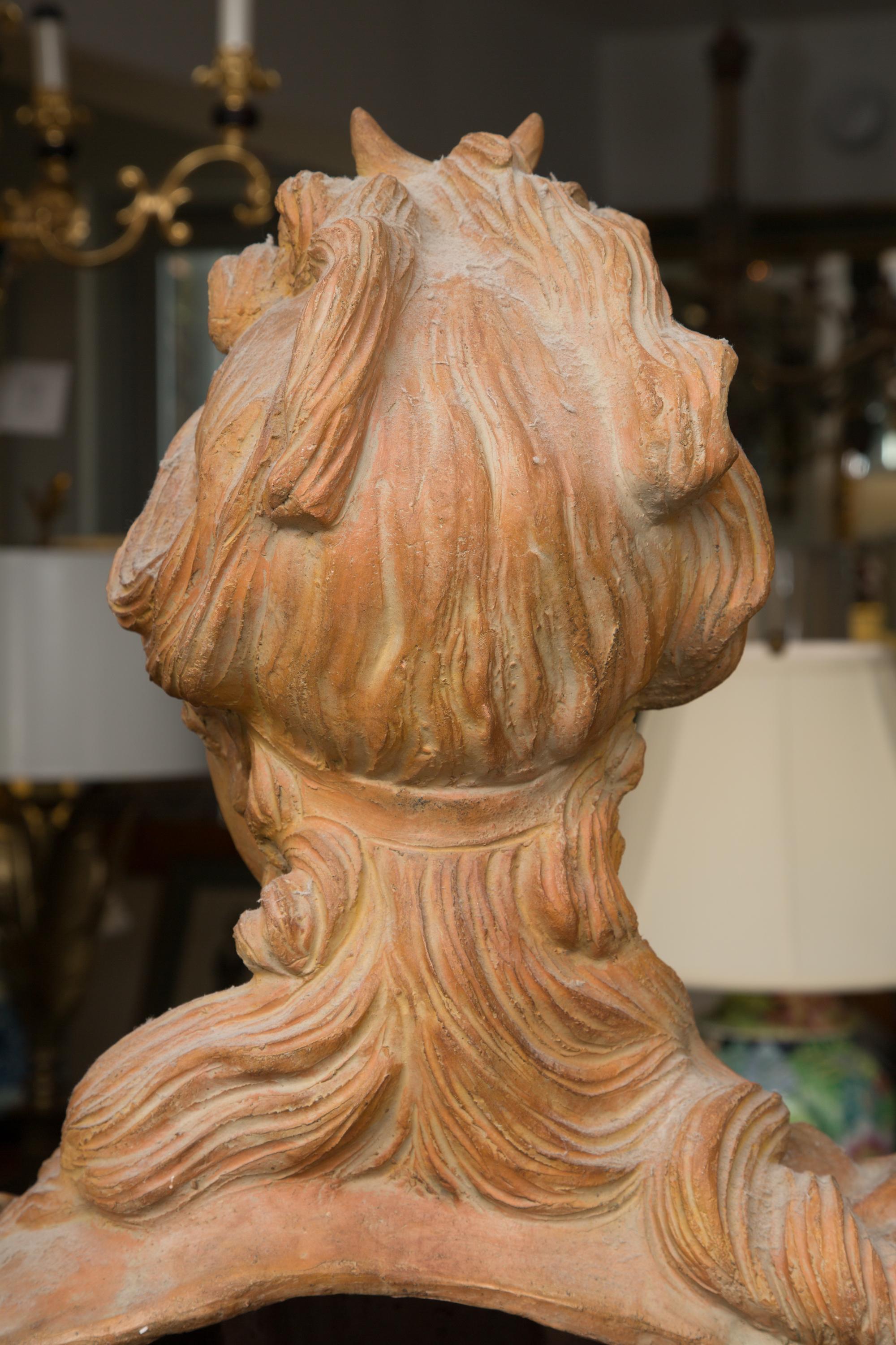 This is an impressive large scale bust formed with terracotta of a Italian noble woman. This beautiful sculpture is hand formed, 20th century.