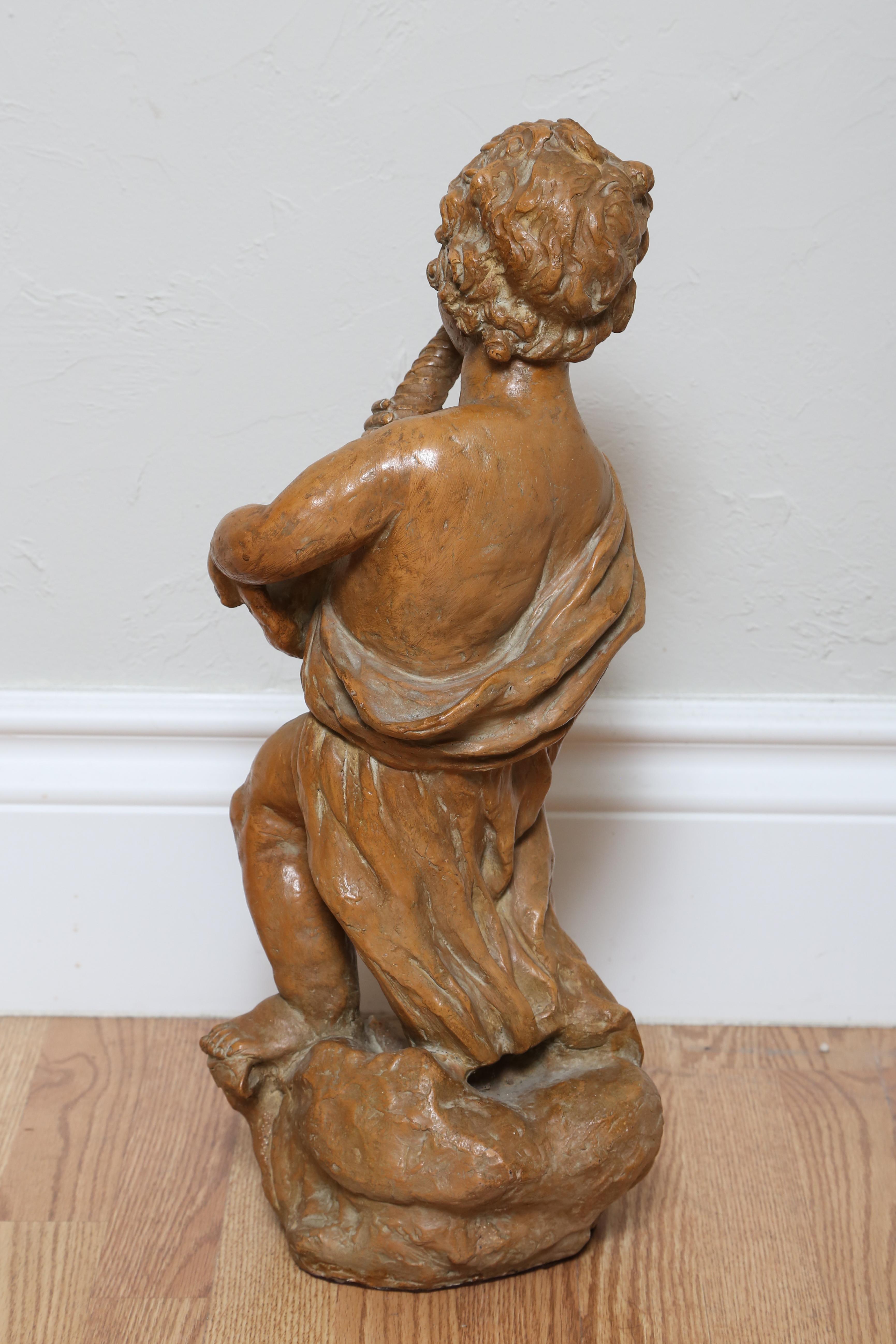 French Terra Cotta Cherub with Horn For Sale