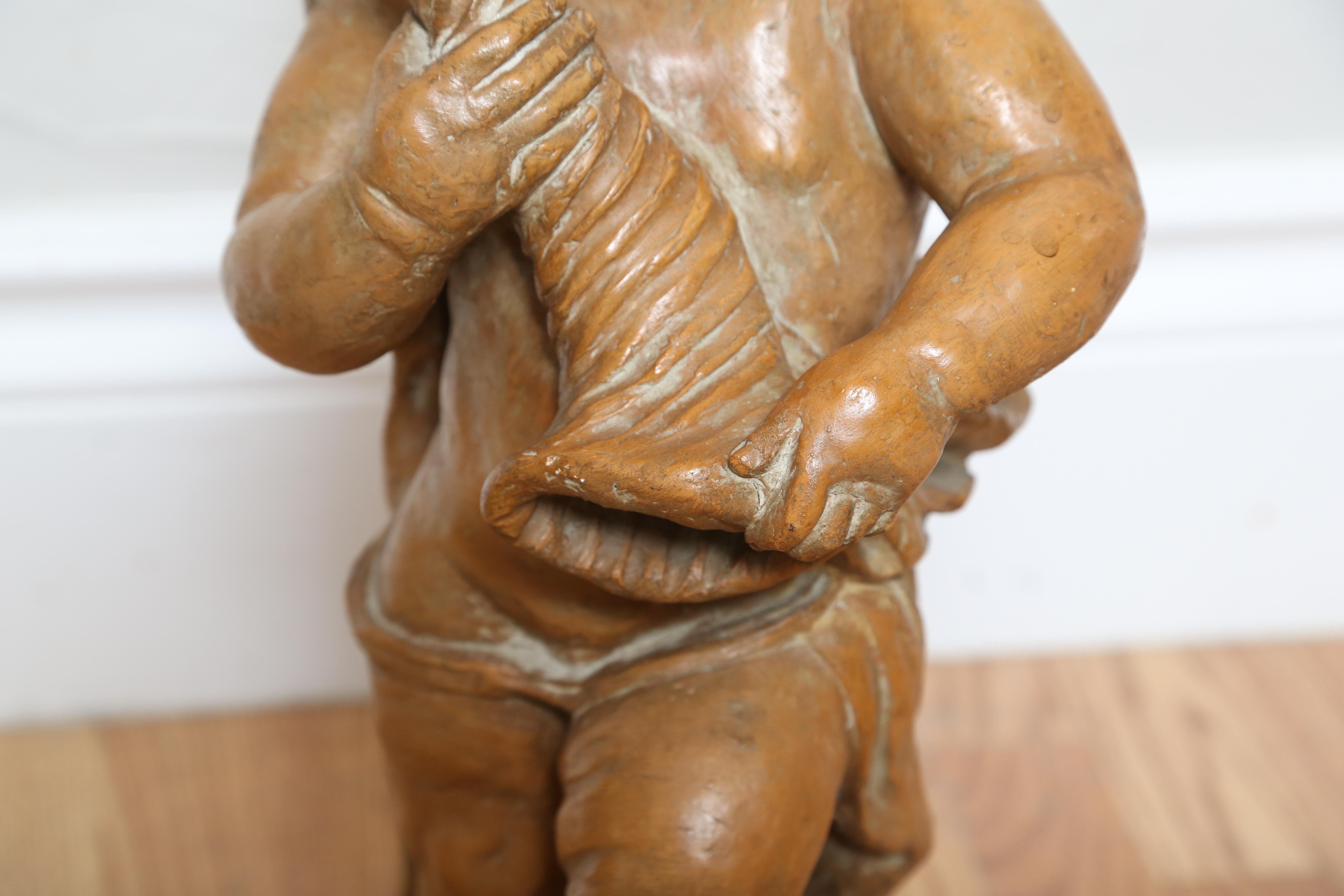 Terra Cotta Cherub with Horn For Sale 2