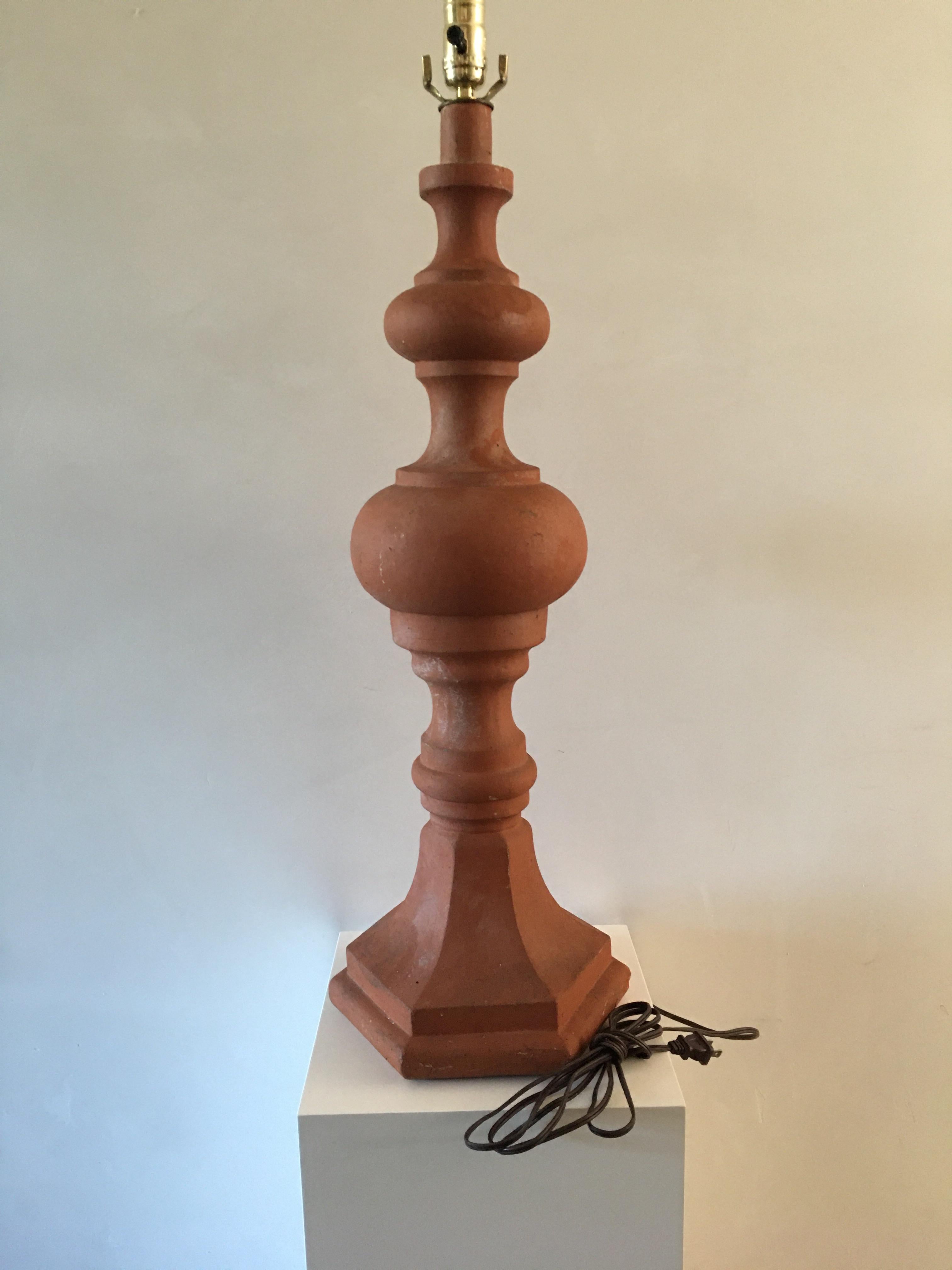 Large ornamental French terra cotta chimney cap converted into tall lamp. It is newly wired for US electrical requirements. It has a three way switch.  Shade is not included.