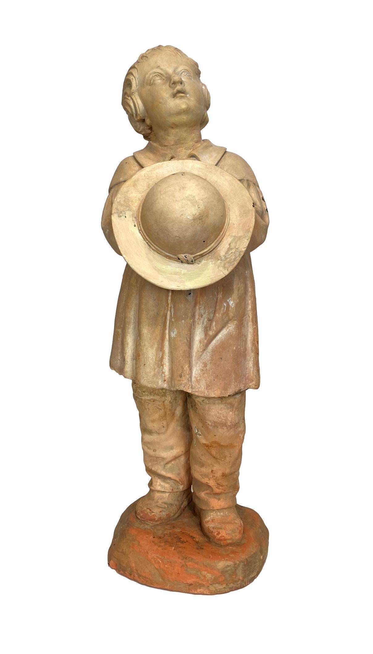 Terra Cotta Figure of a Boy with Hat, French, ca. 1890 In Good Condition In Banner Elk, NC