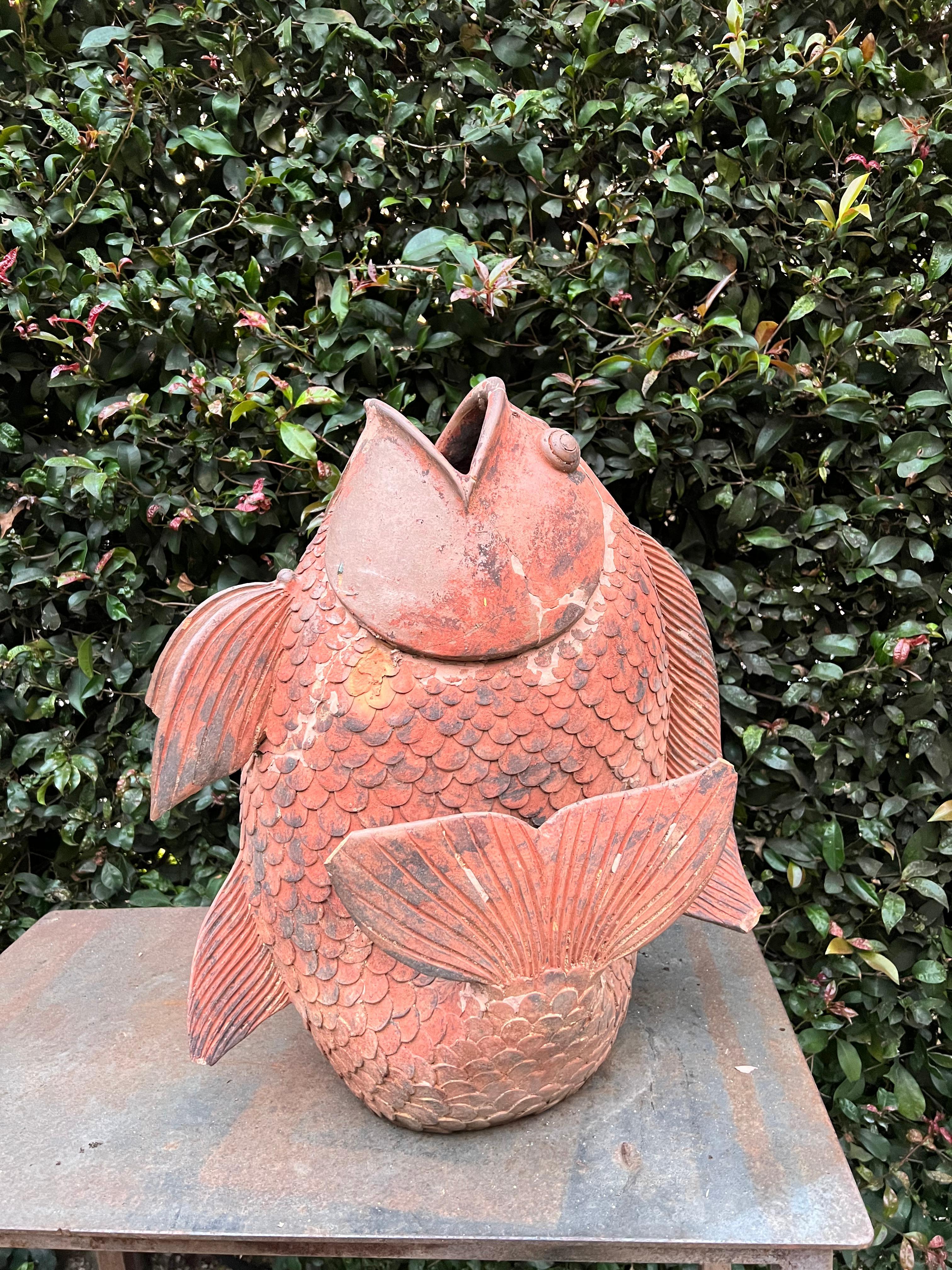 large terracotta fish planter
