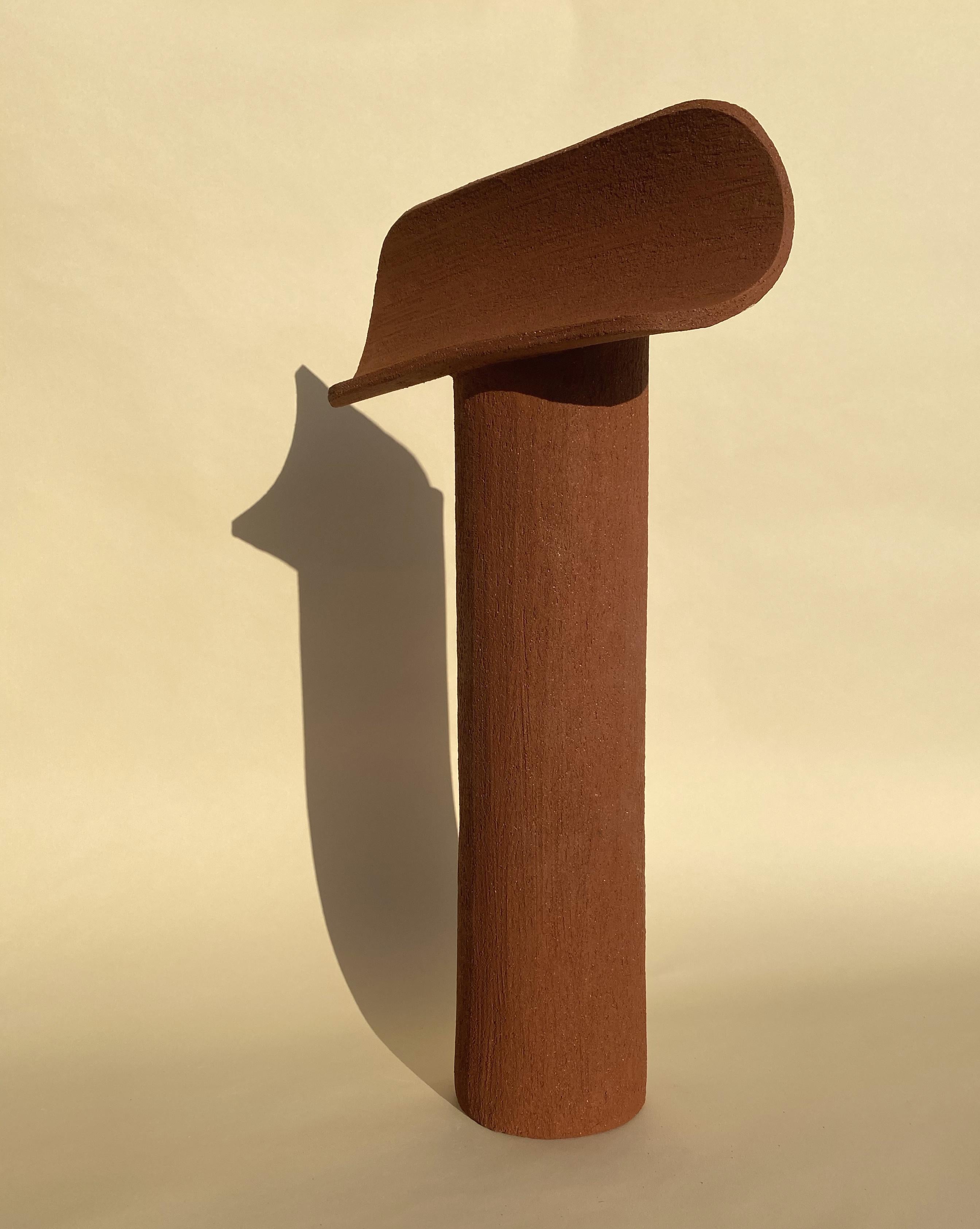 Terra cotta large TOTEM by Olivia Cognet
Materials: Red clay
Dimensions: H Around 55-60 cm

TOTEM
Vases, lamps and sculptures with graphic forms, made from red clay that gives them a rough look..

Each of Olivia’s handmade creations is a