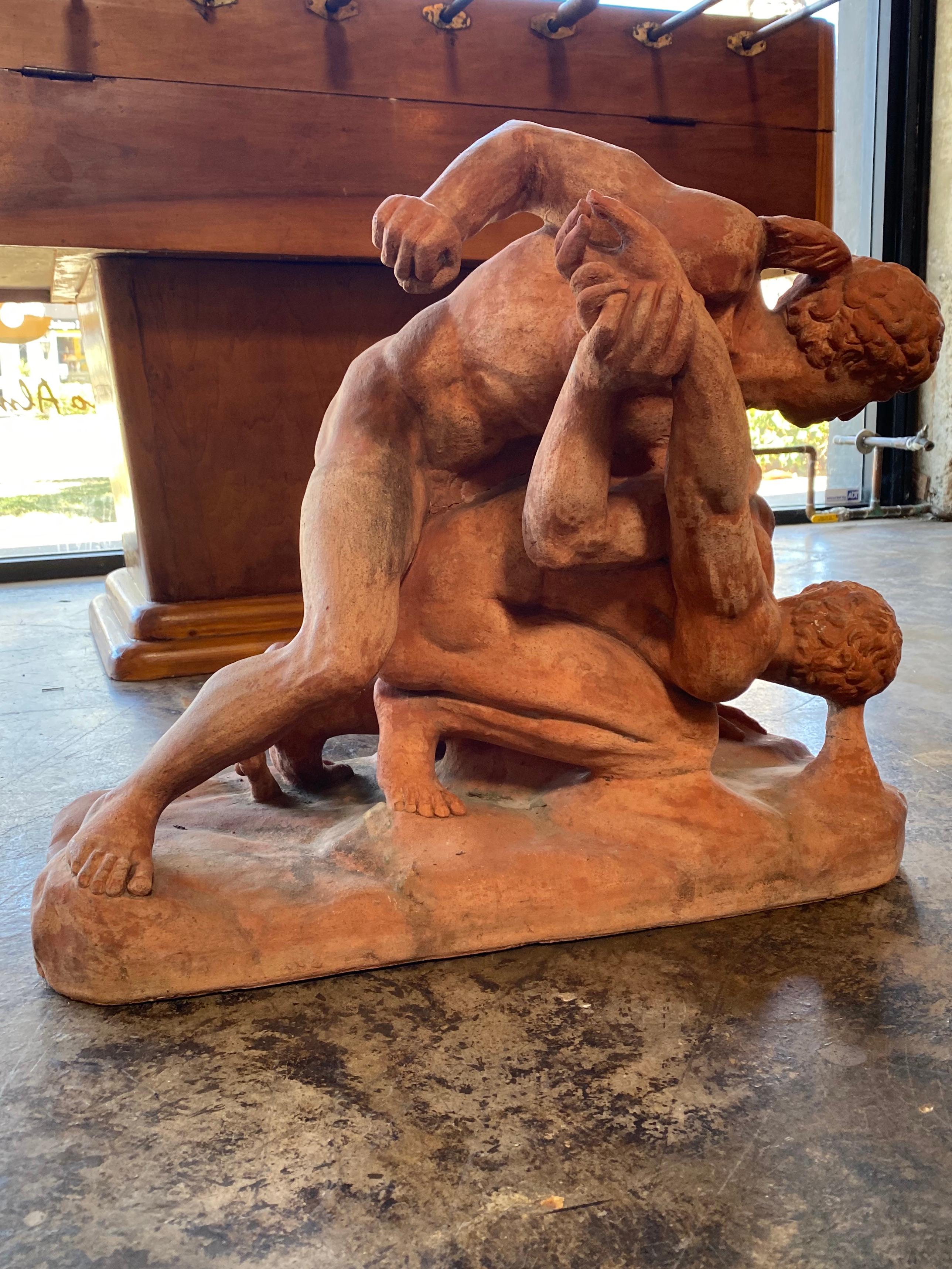 An Italian 19th century terracotta sculpture of the Uffizi wrestlers. In good condition by Vincenzo Vela

The sculpture of the Uffizi wrestlers, originally based on a lost Greek bronze dating back to the 3rd century BC, was brought to immediate