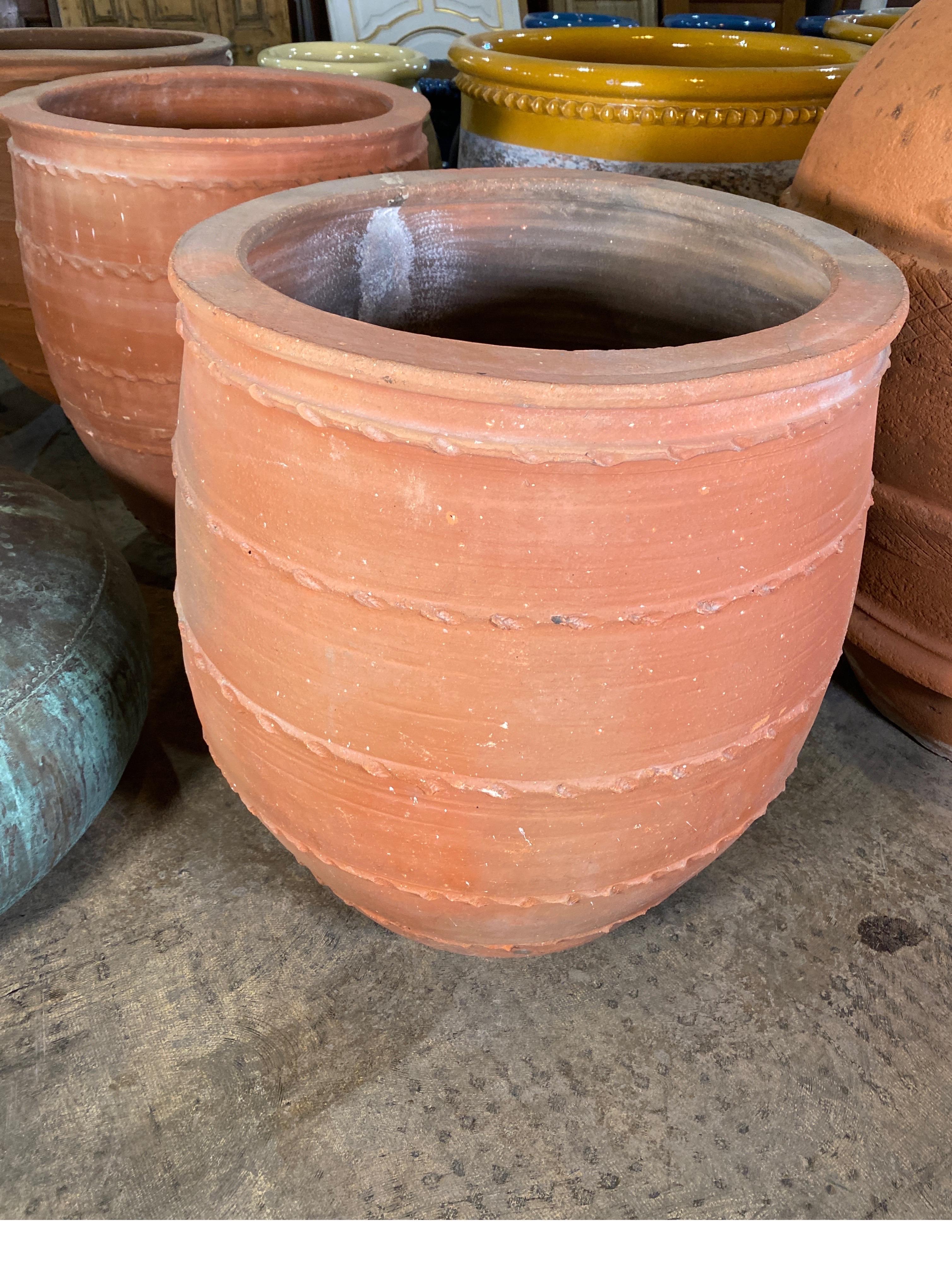 Terra cotta urn handcrafted in France.
