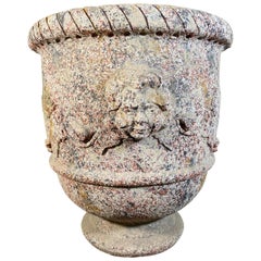 Terrakotta-Urne mit Gesicht