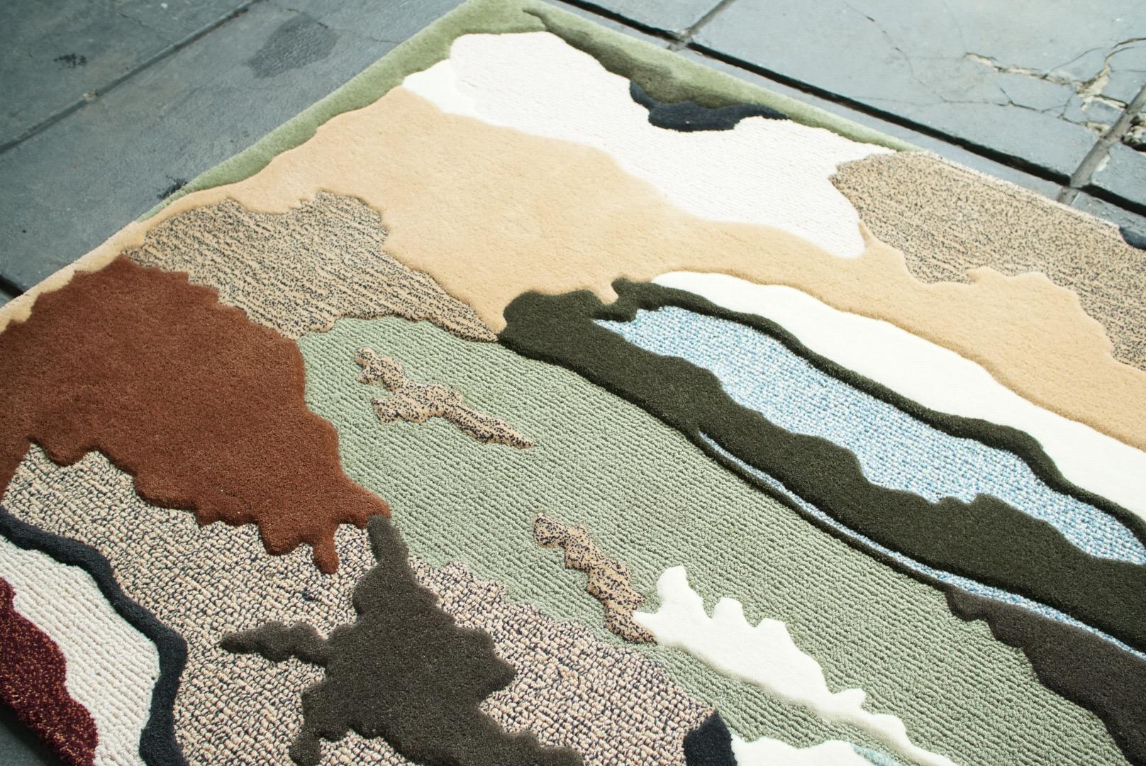 Alfombra Terra Flow
Esta alfombra tiene una estética terrosa, orgánica y abstracta, con una paleta de colores inspirada en la naturaleza y una mezcla de texturas. 

Inspirada en la cruda belleza de la naturaleza, la alfombra Terra Flow presenta un
