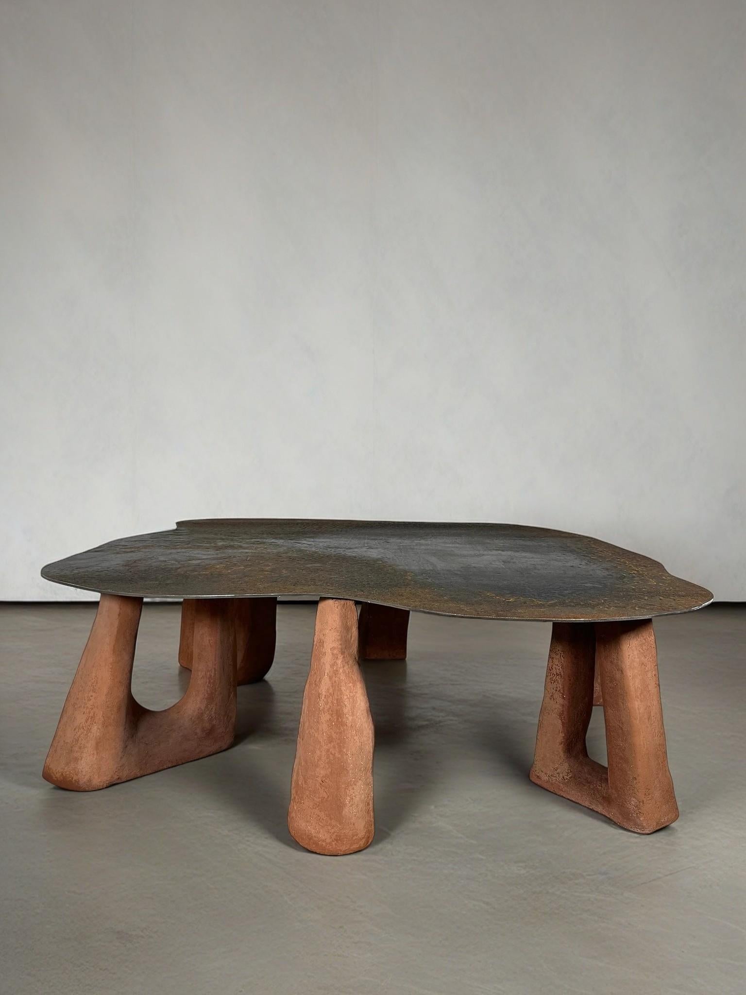 Terra Table by Aeny Studio
Limited Edition
Dimensions: D 116 x W 118 x H 38 cm.
Materials: Repurposed steel, wood, custom paper composite, gypsum mix,
and pigment.

Each piece is individually hand-sculpted, resulting in variations that make every