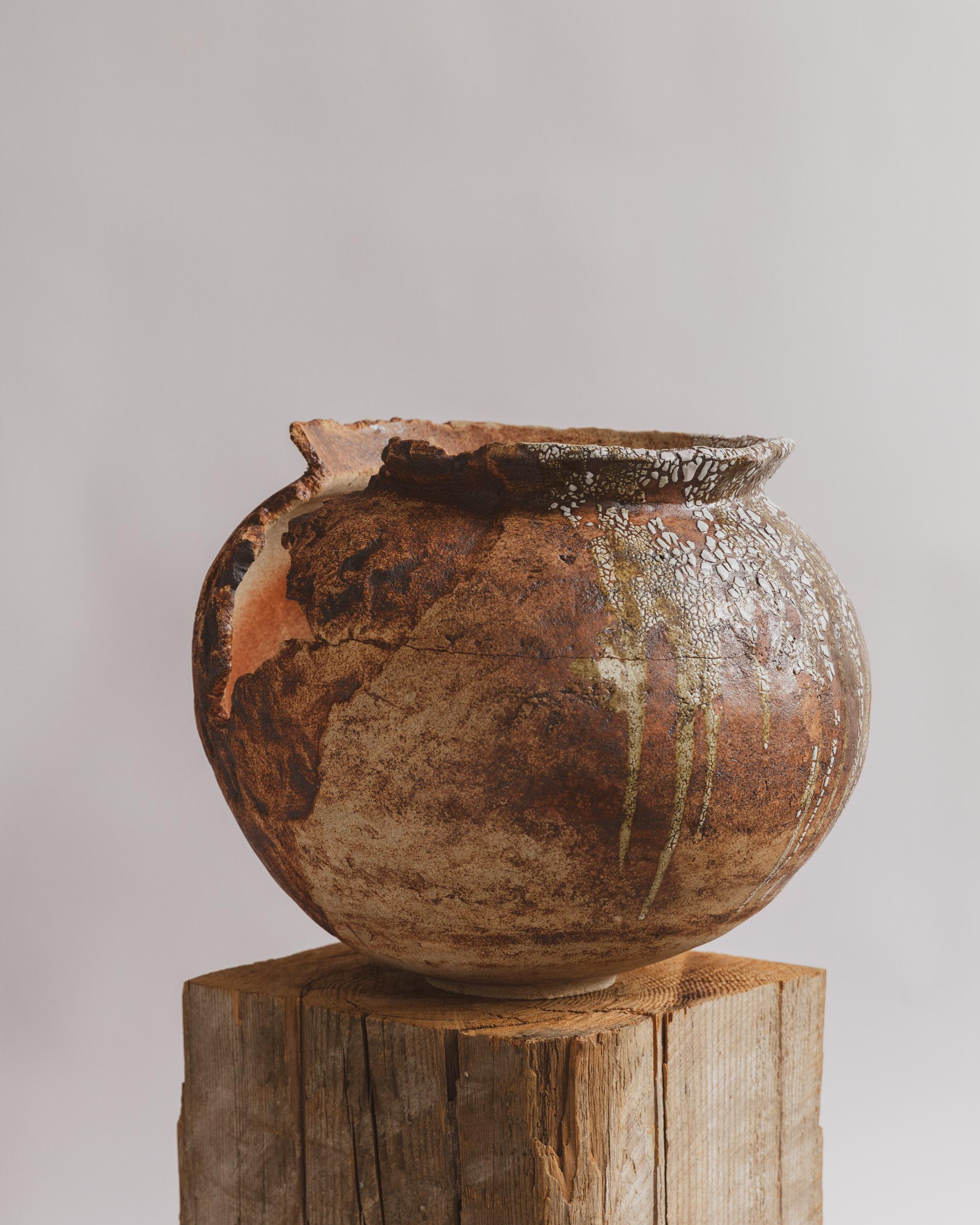 Hand built by New York-based artist Ilona Golovina, Terra Vessel is a one-of-a-kind ceramic sculpture that speaks to the rawness of time and erosion. Using traditional coiling techniques and earth-inspired finishes, Golovina constructs a form that
