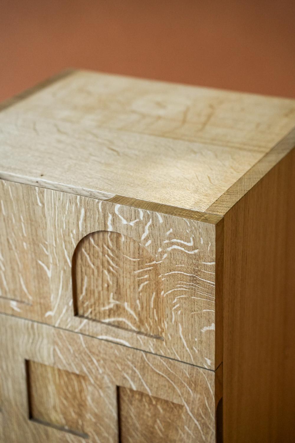 Hand made English Oak End Table. This handcrafted wood end table offers plenty of discreet storage and a great dash of unique character.
Made by the award winning Gareth 'Goldfinch' Brookes in his Manchester studio, his signature style shines