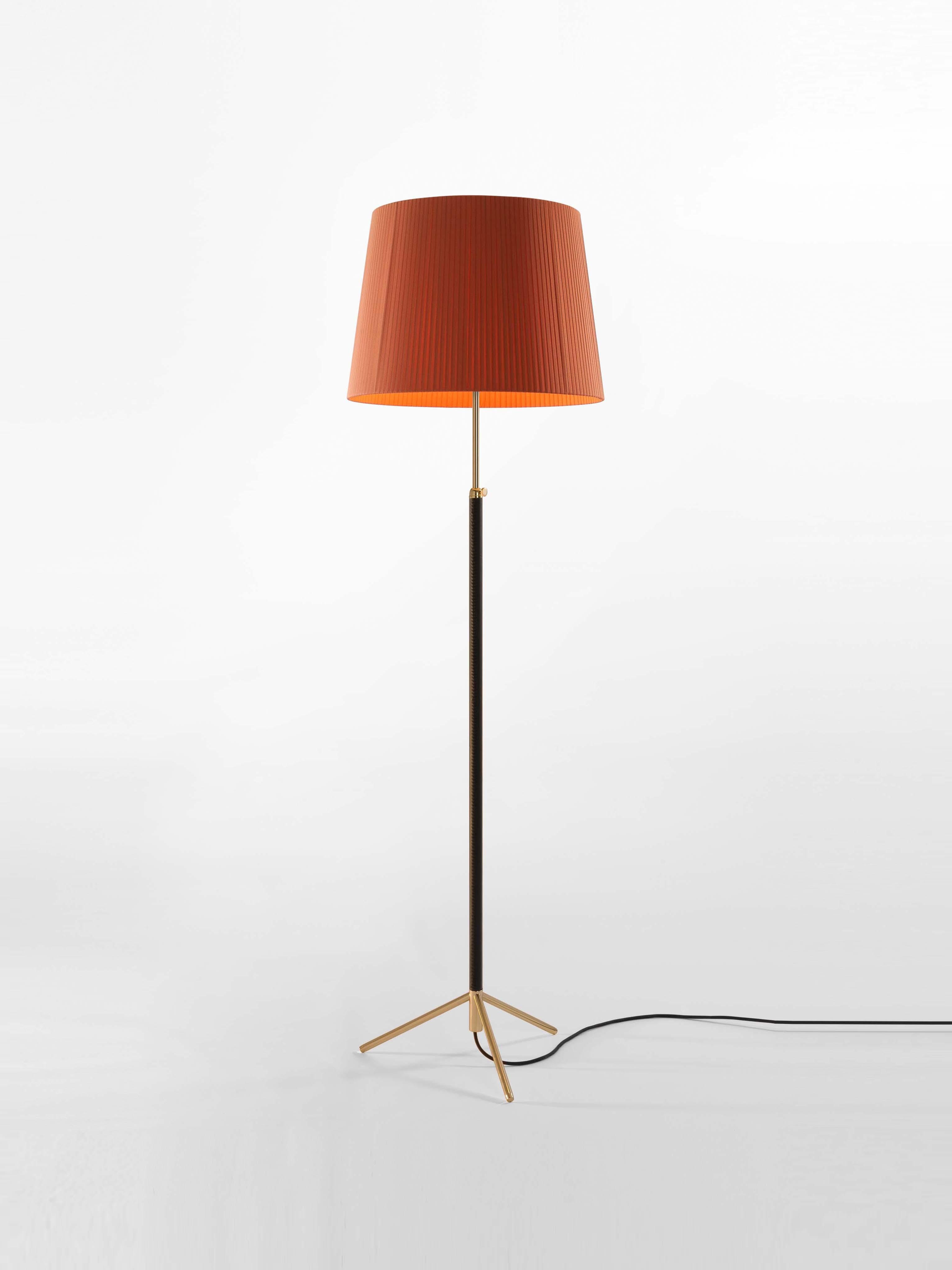 Terracotta and brass Pie de Salón G1 floor lamp by Jaume Sans
Dimensions: D 45 x H 120-160 cm
Materials: Metal, leather, ribbon.
Available in chrome-plated or polished brass structure.
Available in other shade colors and sizes.

This slender