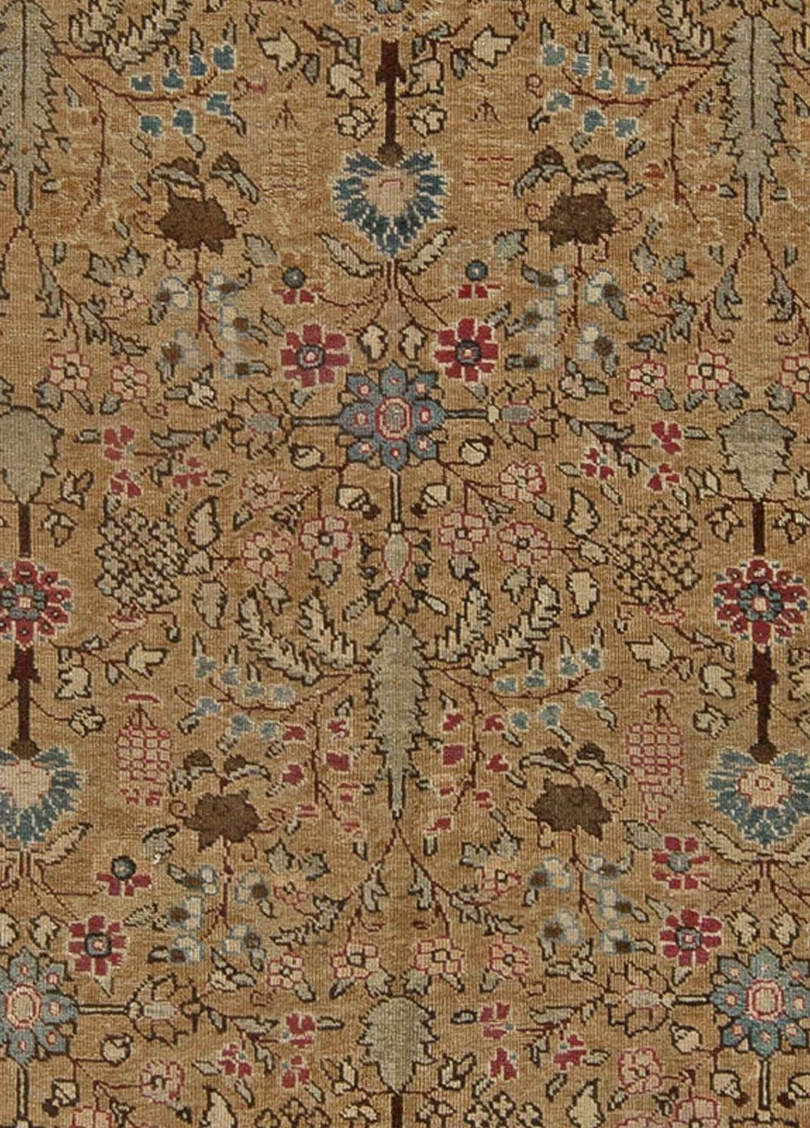 Antique Persian Tabriz rug.
Size: 9'2