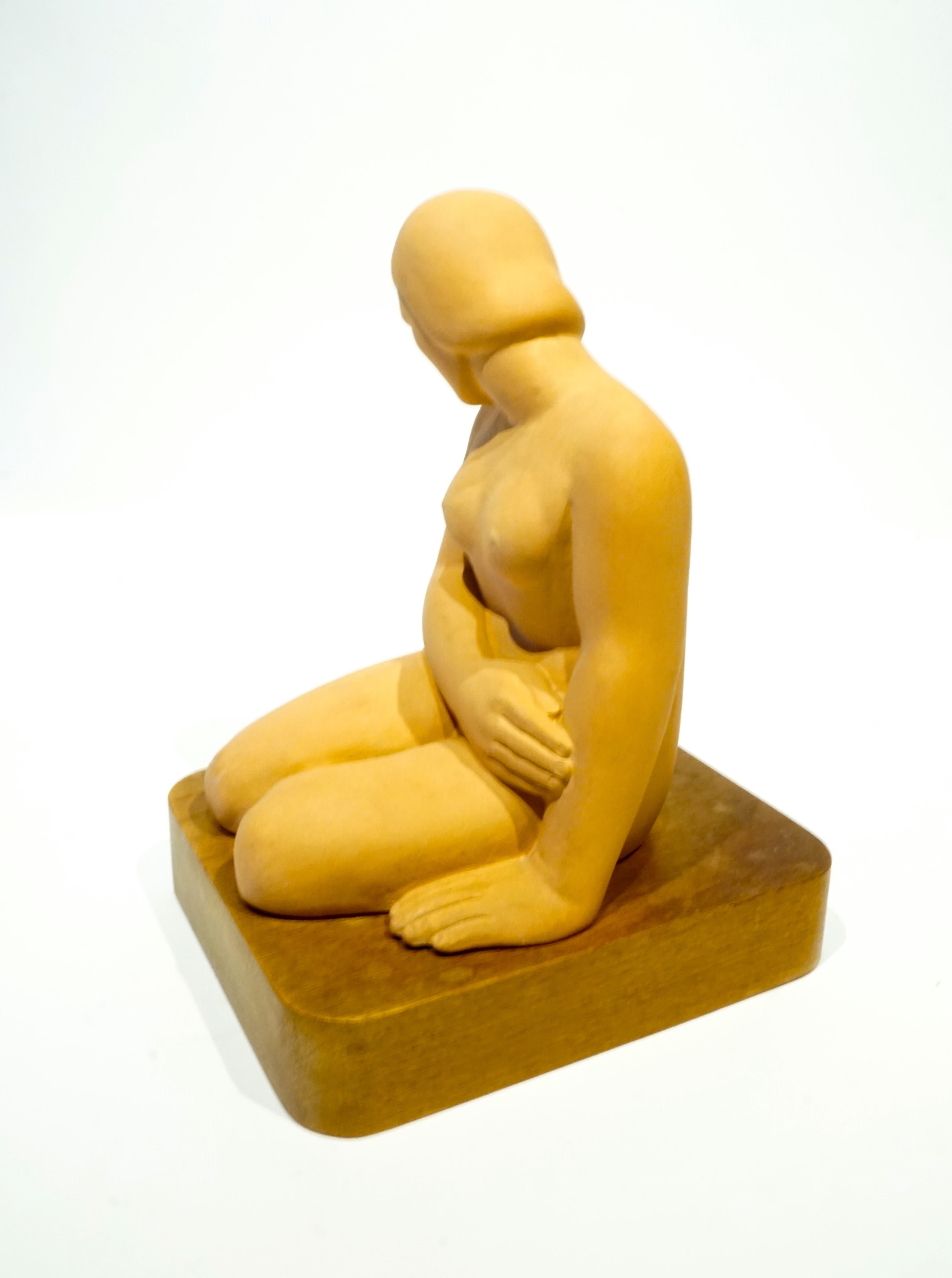 Art Moderne terracotta female figure on wooden base by San Francisco artist Vera Bernhard, circa 1940. The artist name appears tangentially in newspapers and in a San Francisco Art Museum exhibition guide in 1938. There is a pencil notation on the