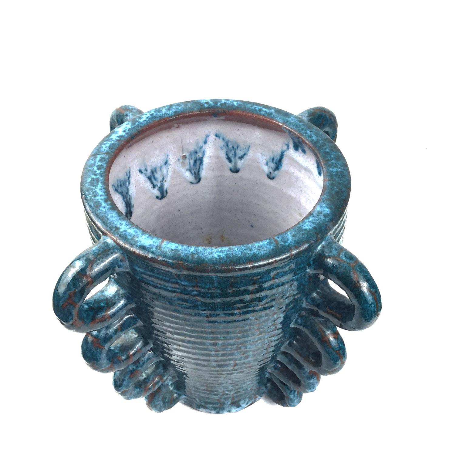 Terracotta and turquoise glazed vase from the pottery manufacturer Accolay France
Uncommon interesting shape with multiples handles.