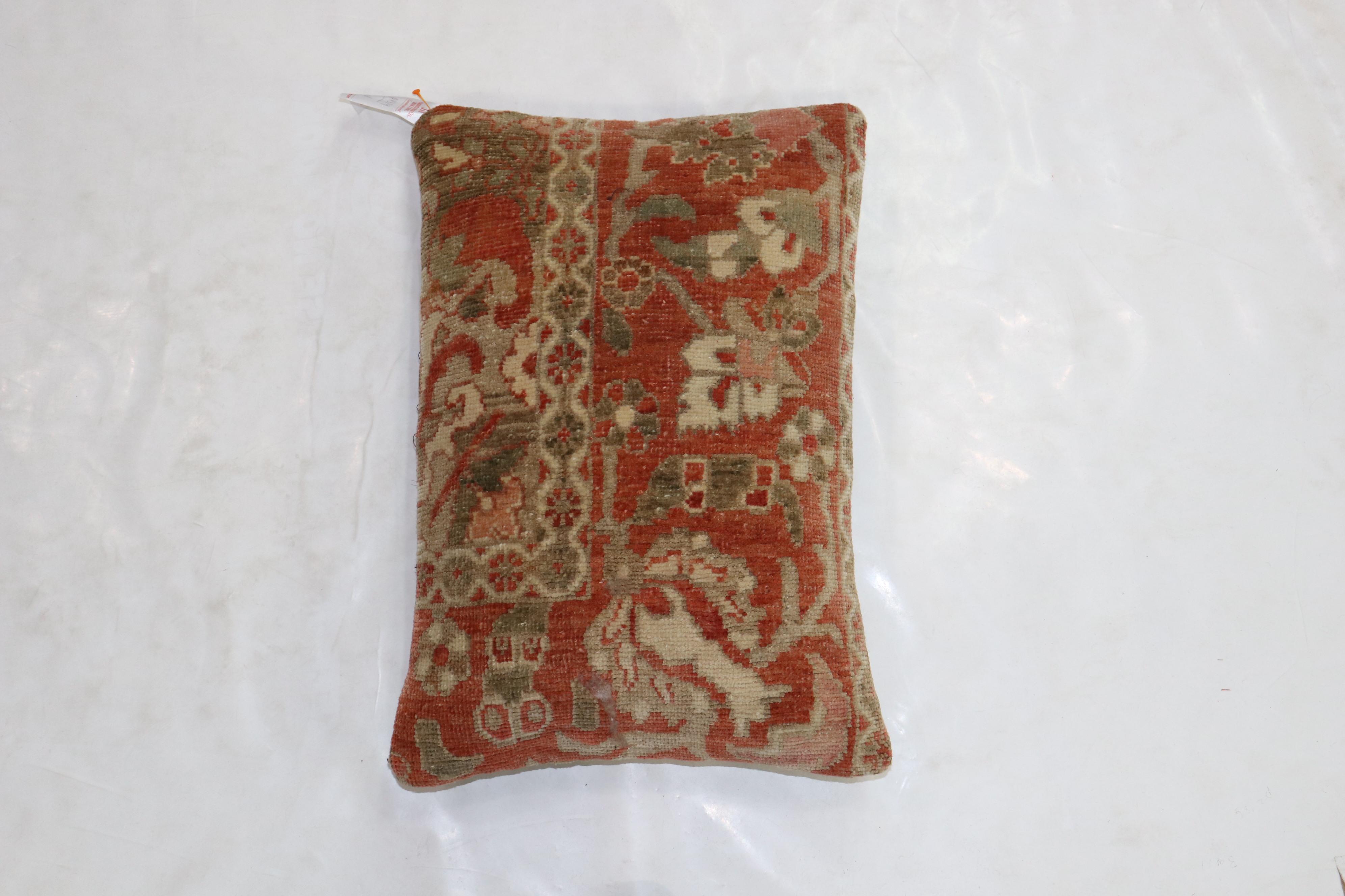 Pillow made from a Persian a Malayer rug. Terracotta, brown and ivory accents

Measures: 16
